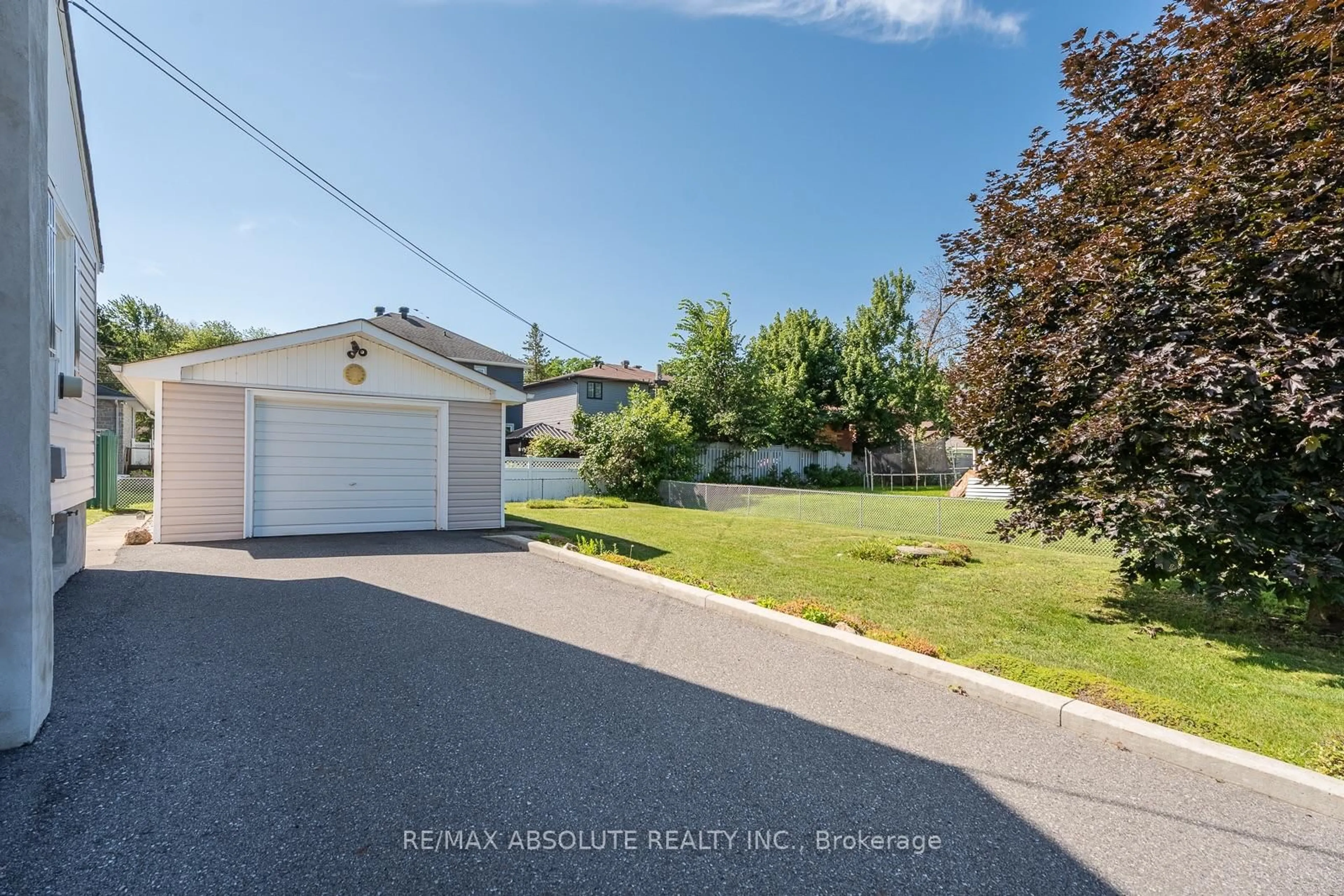A pic from outside/outdoor area/front of a property/back of a property/a pic from drone, street for 1880 Kingsdale Ave, Ottawa Ontario K1T 1J1