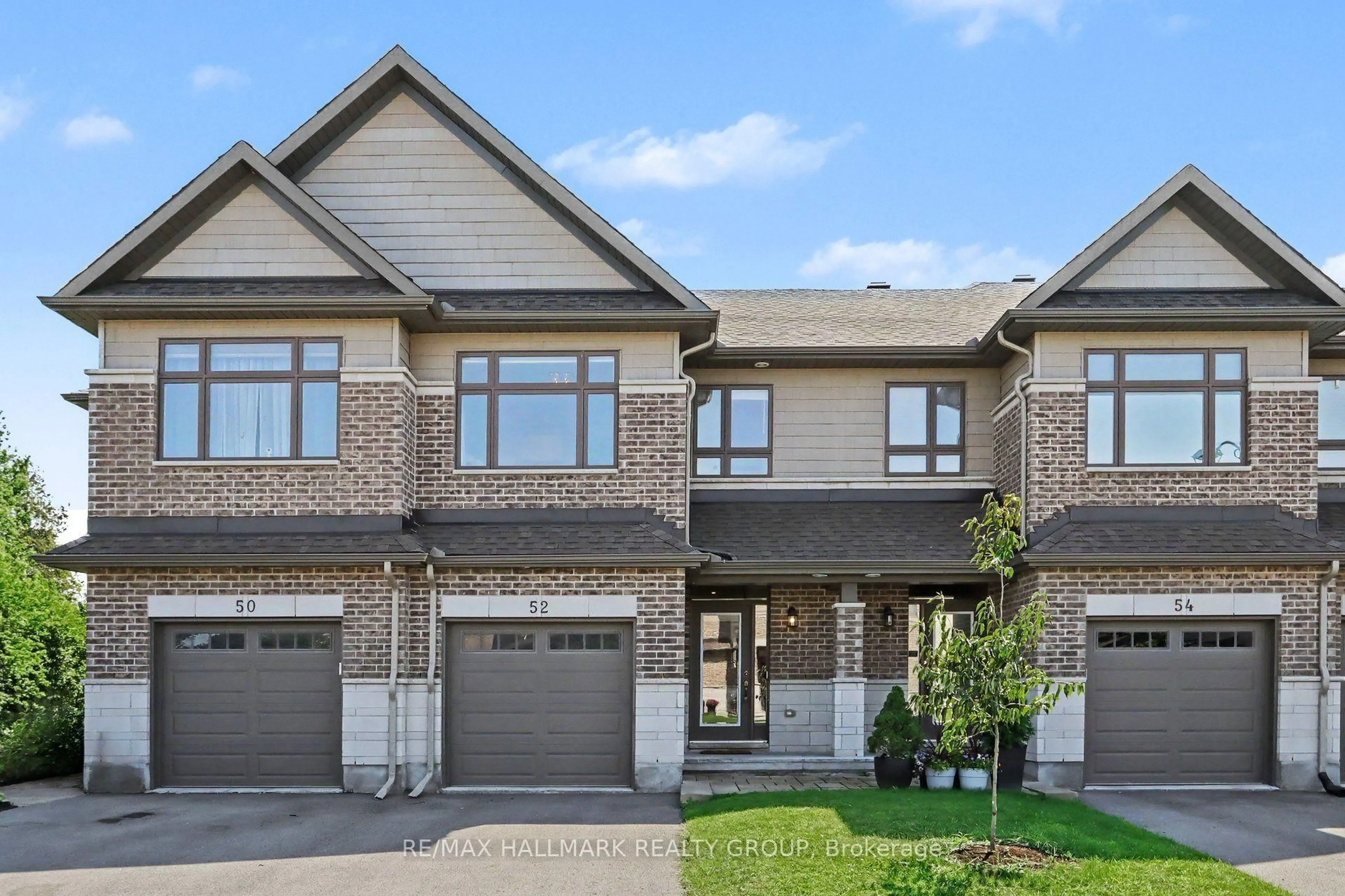 Home with brick exterior material, street for 52 Porter St, Stittsville Ontario K2S 2L9