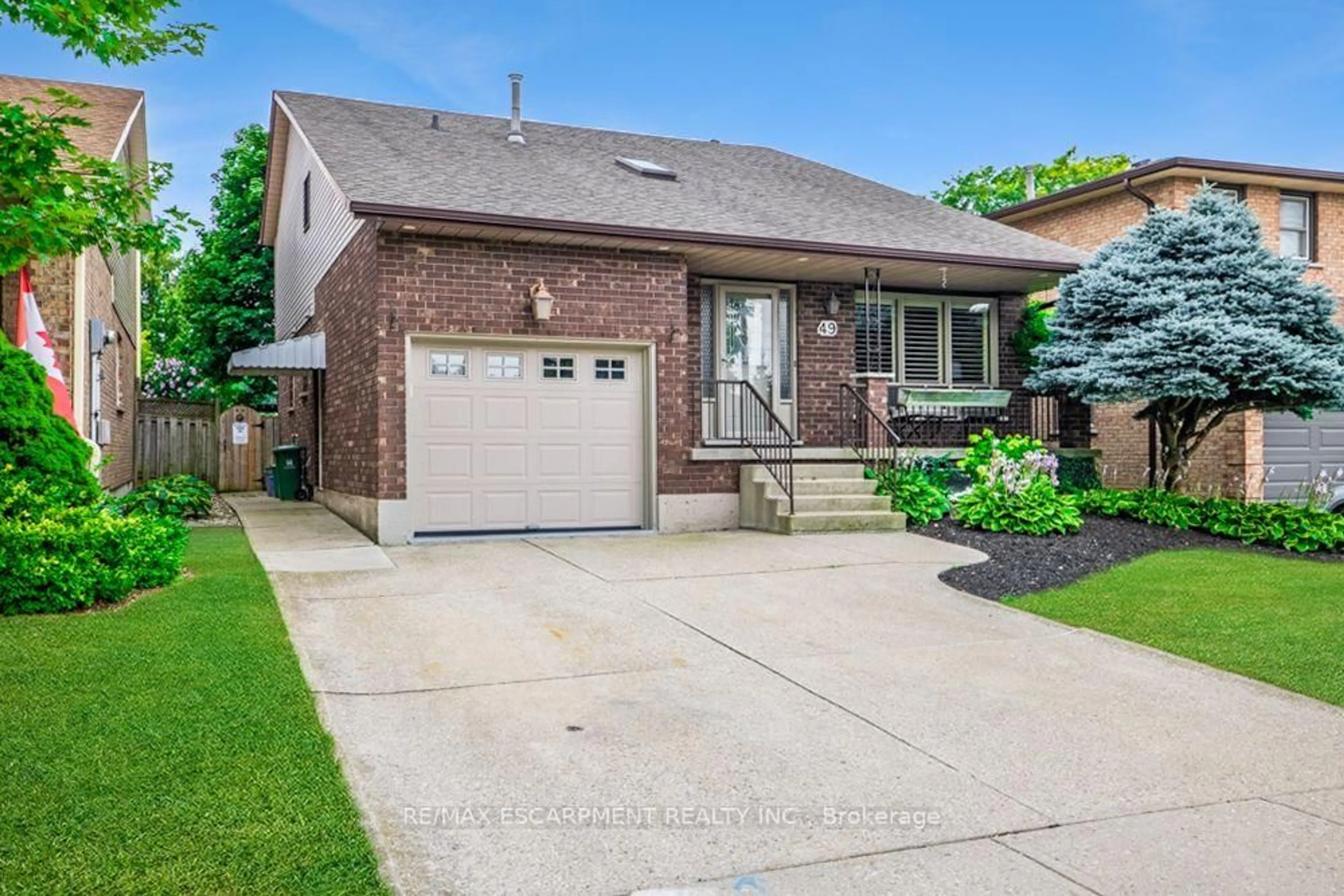 Home with brick exterior material, street for 49 Branthaven Dr, Hamilton Ontario L8J 2M2