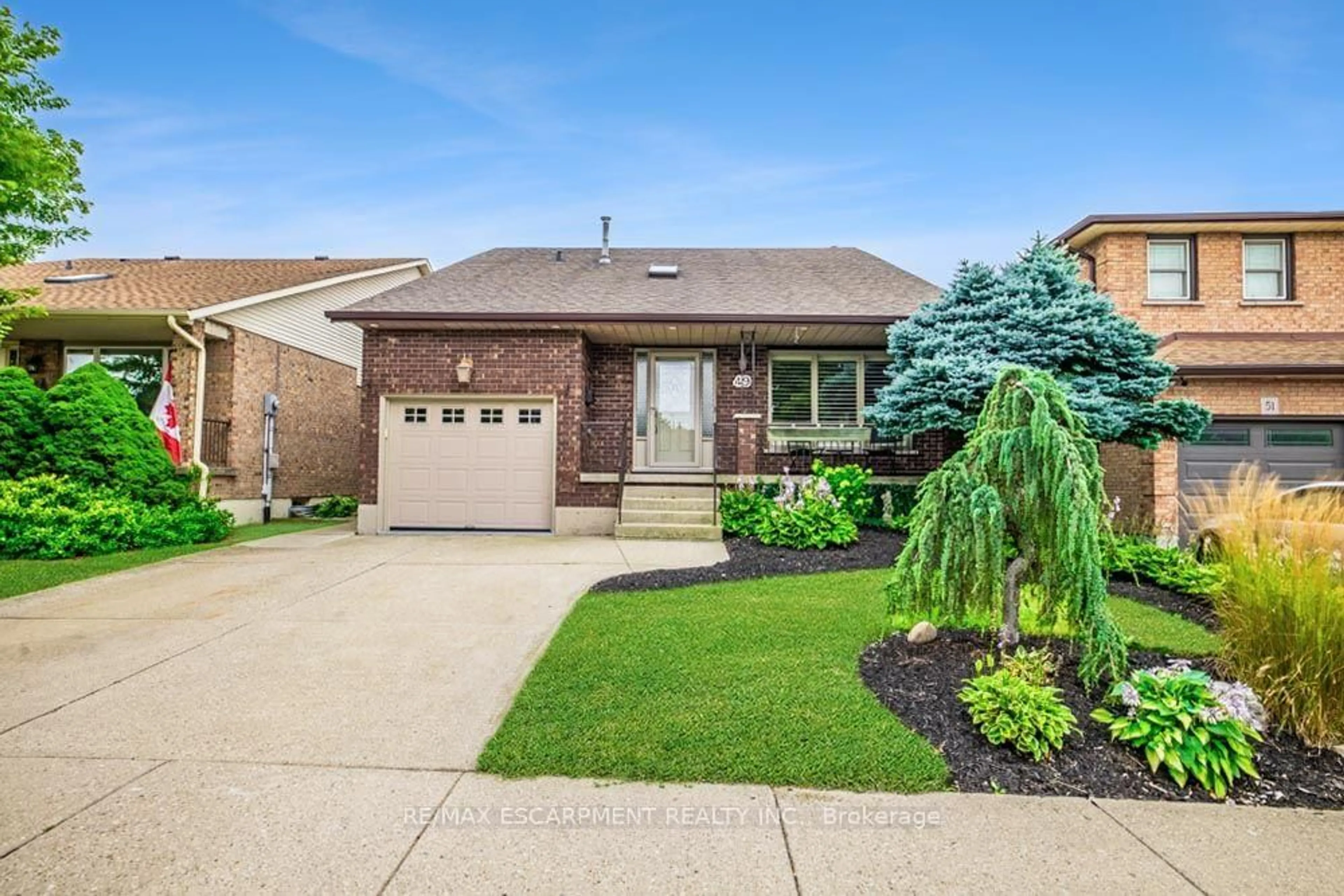 Home with brick exterior material, street for 49 Branthaven Dr, Hamilton Ontario L8J 2M2