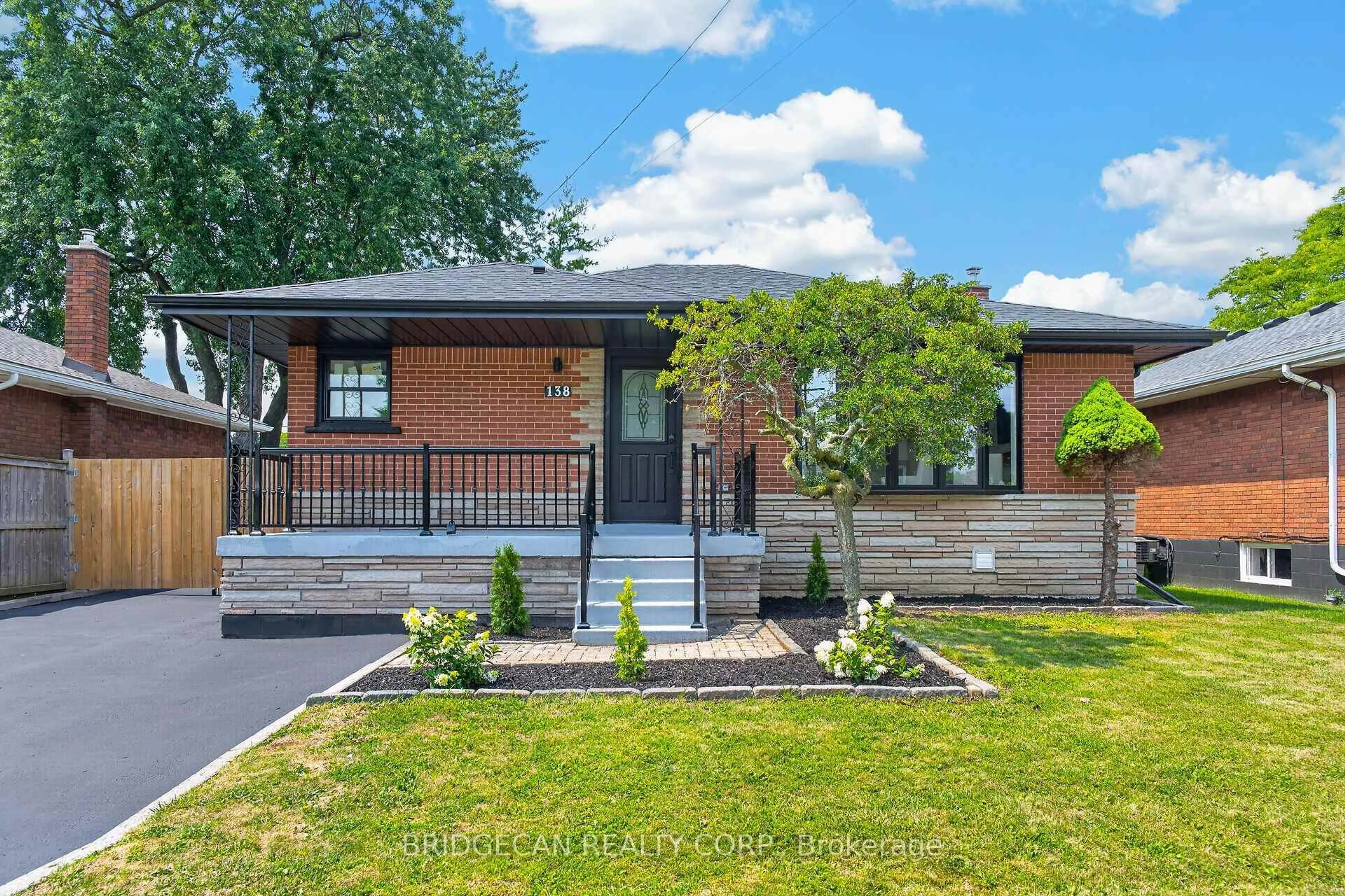 Home with brick exterior material, street for 138 Rendell Blvd, Hamilton Ontario L8T 3P6