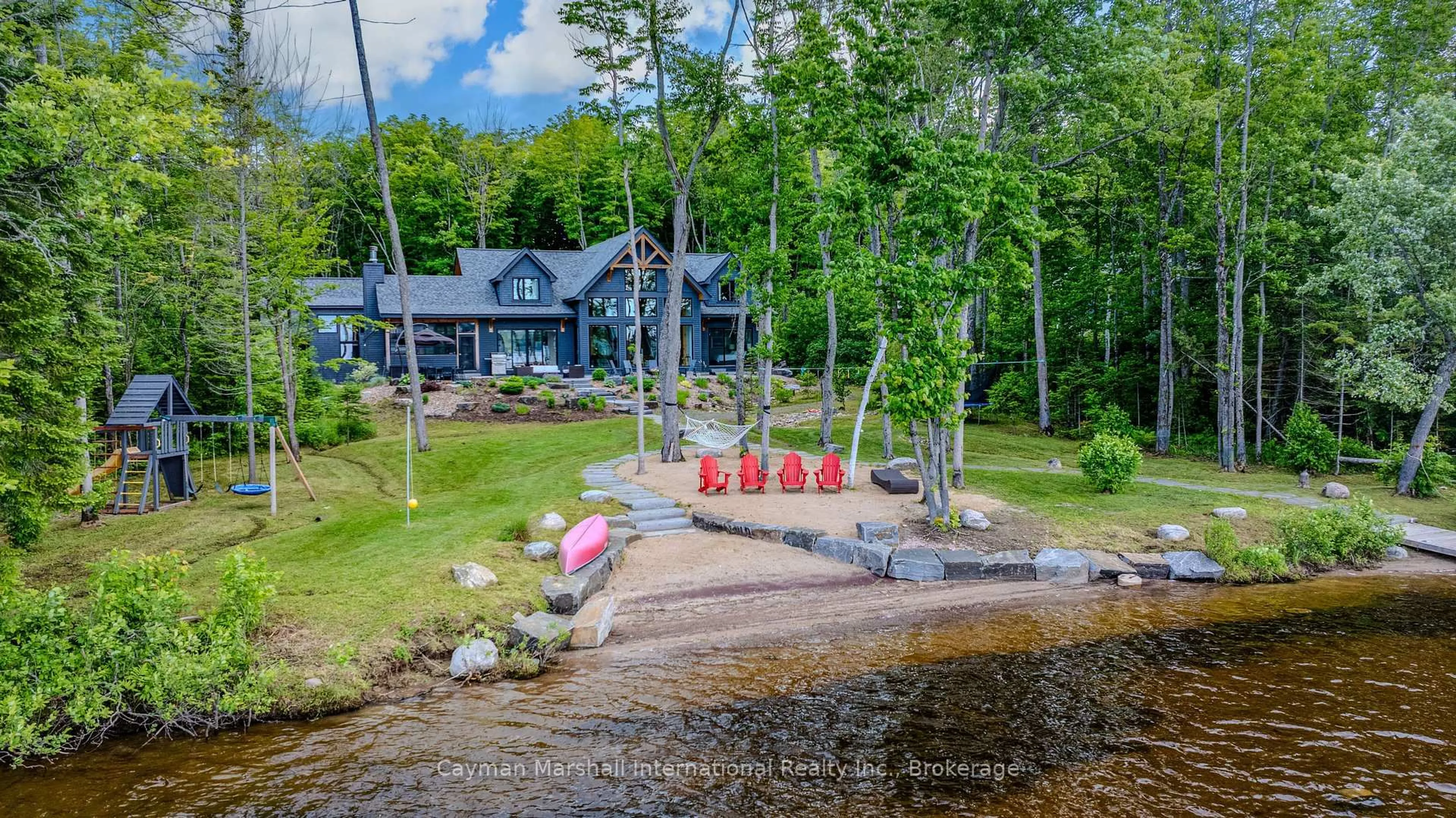 A pic from outside/outdoor area/front of a property/back of a property/a pic from drone, water/lake/river/ocean view for 1093 Northwood Beach Dr, Ryerson Ontario P0A 1Y0