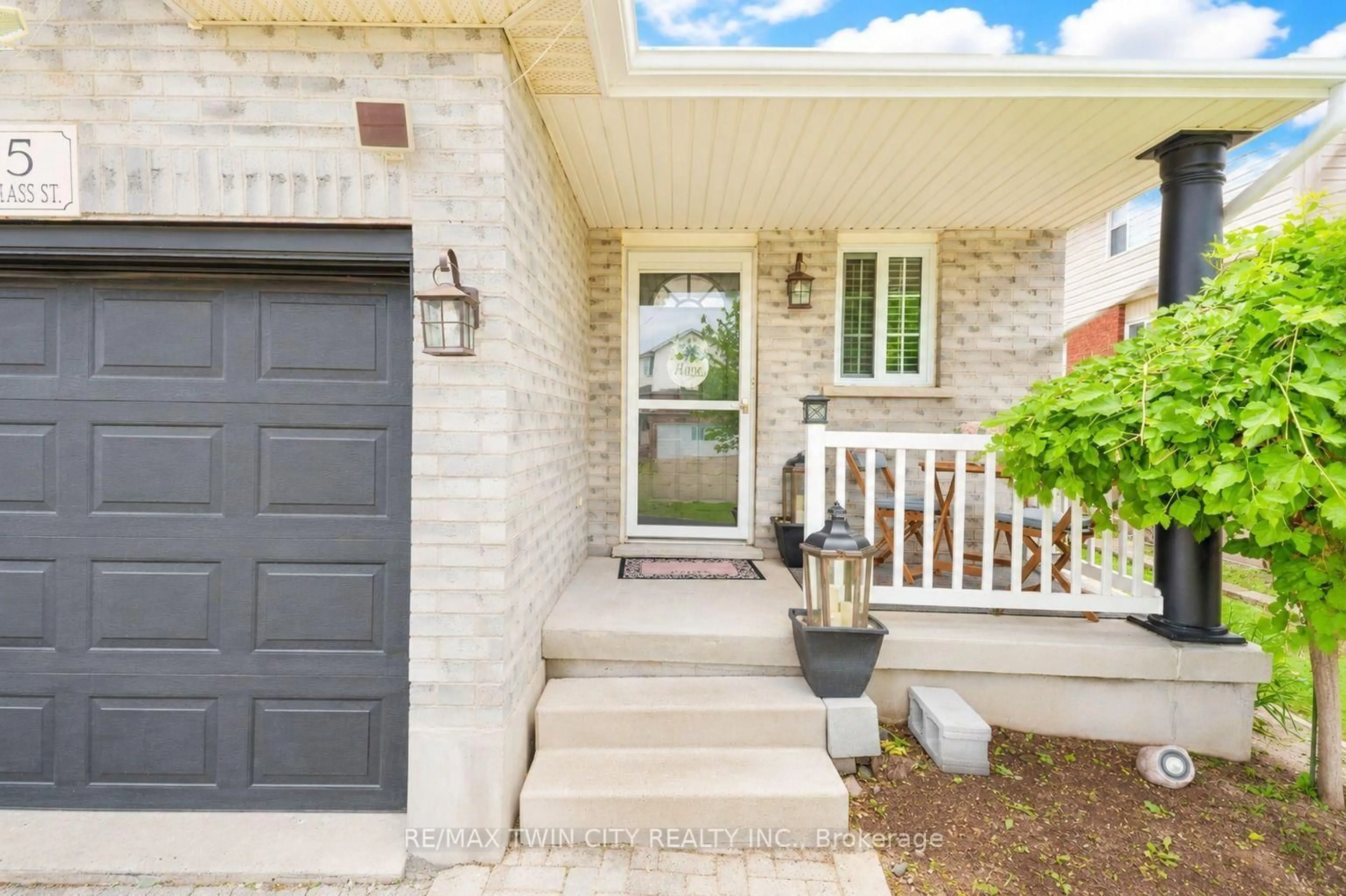 Home with brick exterior material, street for 135 Cotton Grass St, Kitchener Ontario N2E 3T5