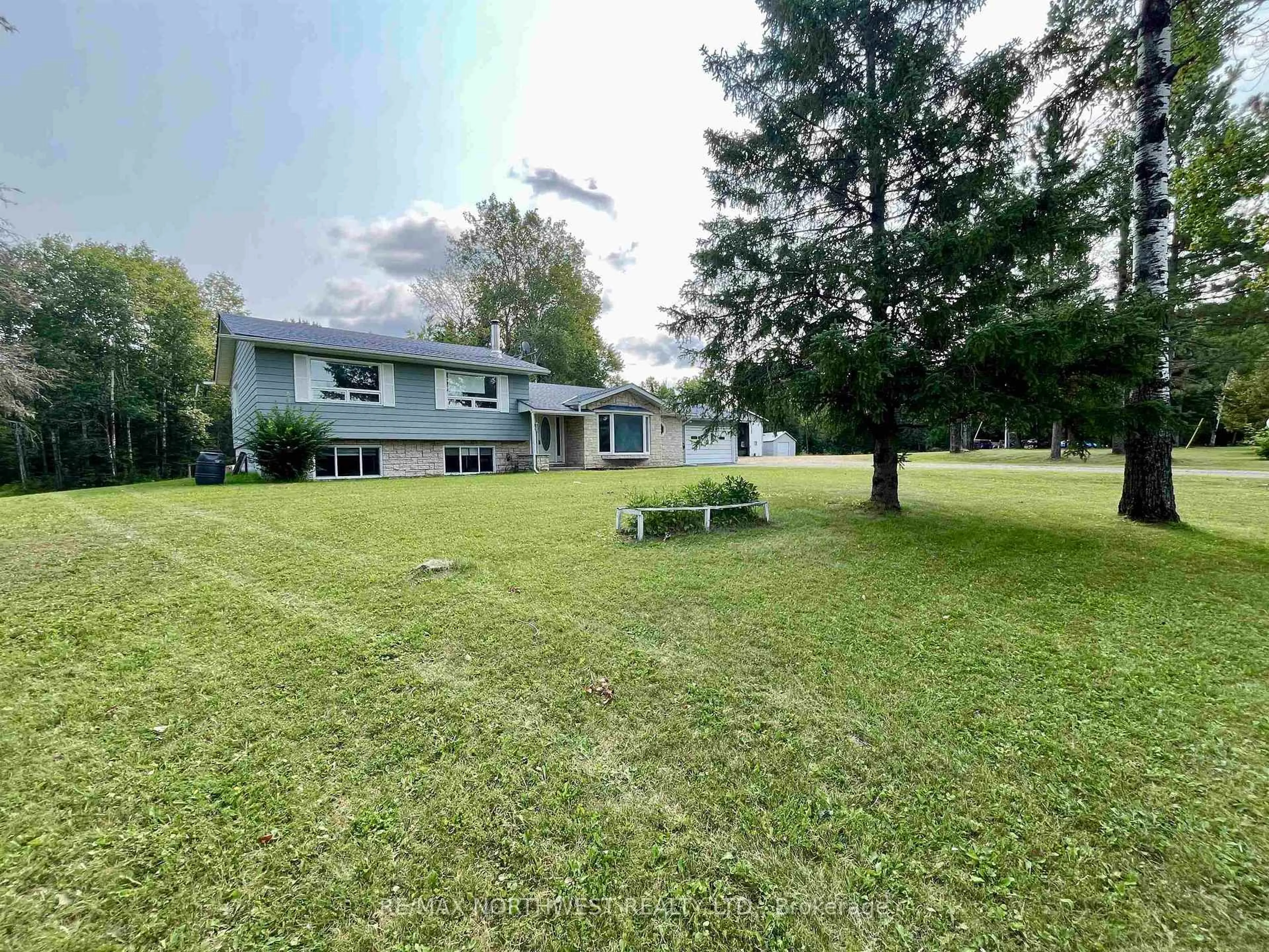 A pic from outside/outdoor area/front of a property/back of a property/a pic from drone, water/lake/river/ocean view for 3448 HWY 71, Chapple Ontario P0W 1E0