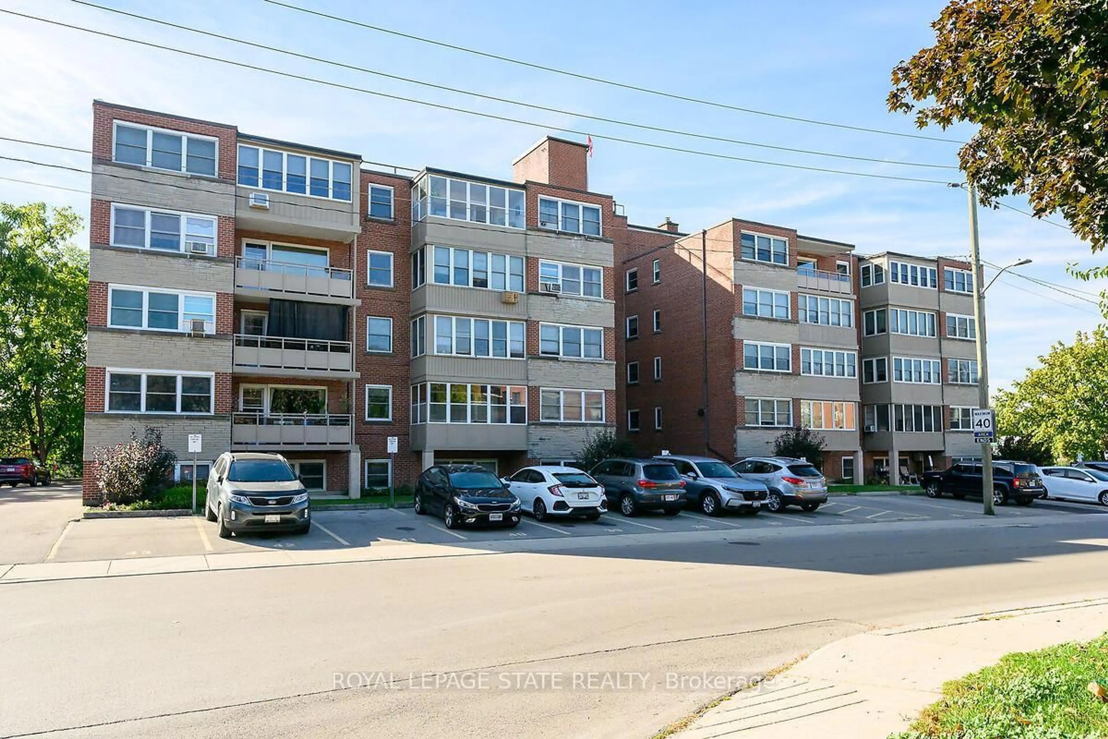 A pic from outside/outdoor area/front of a property/back of a property/a pic from drone, street for 9 Grant Blvd #107, Hamilton Ontario L9H 4L5