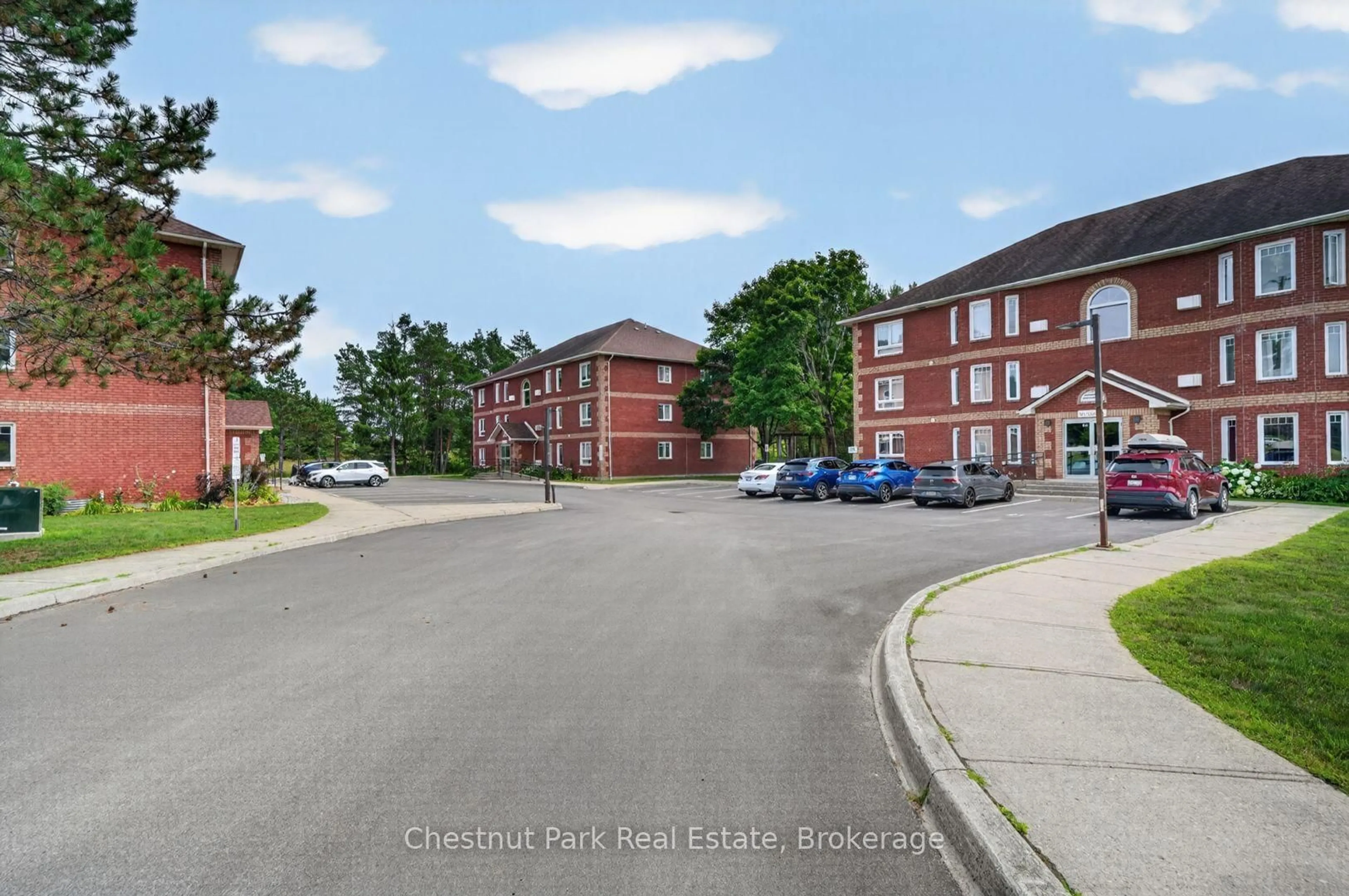 A pic from outside/outdoor area/front of a property/back of a property/a pic from drone, street for 661 Cedar Lane #202C, Bracebridge Ontario P1L 1N9