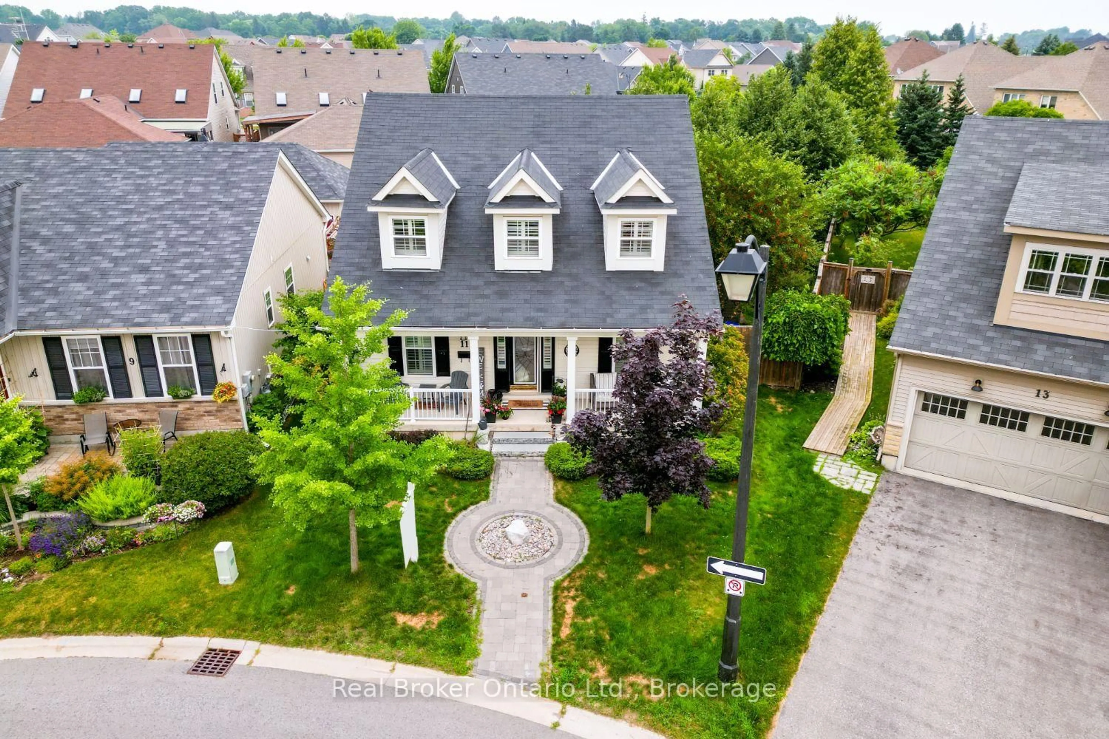 A pic from outside/outdoor area/front of a property/back of a property/a pic from drone, street for 11 Greenaway Circ, Port Hope Ontario L1A 0B9
