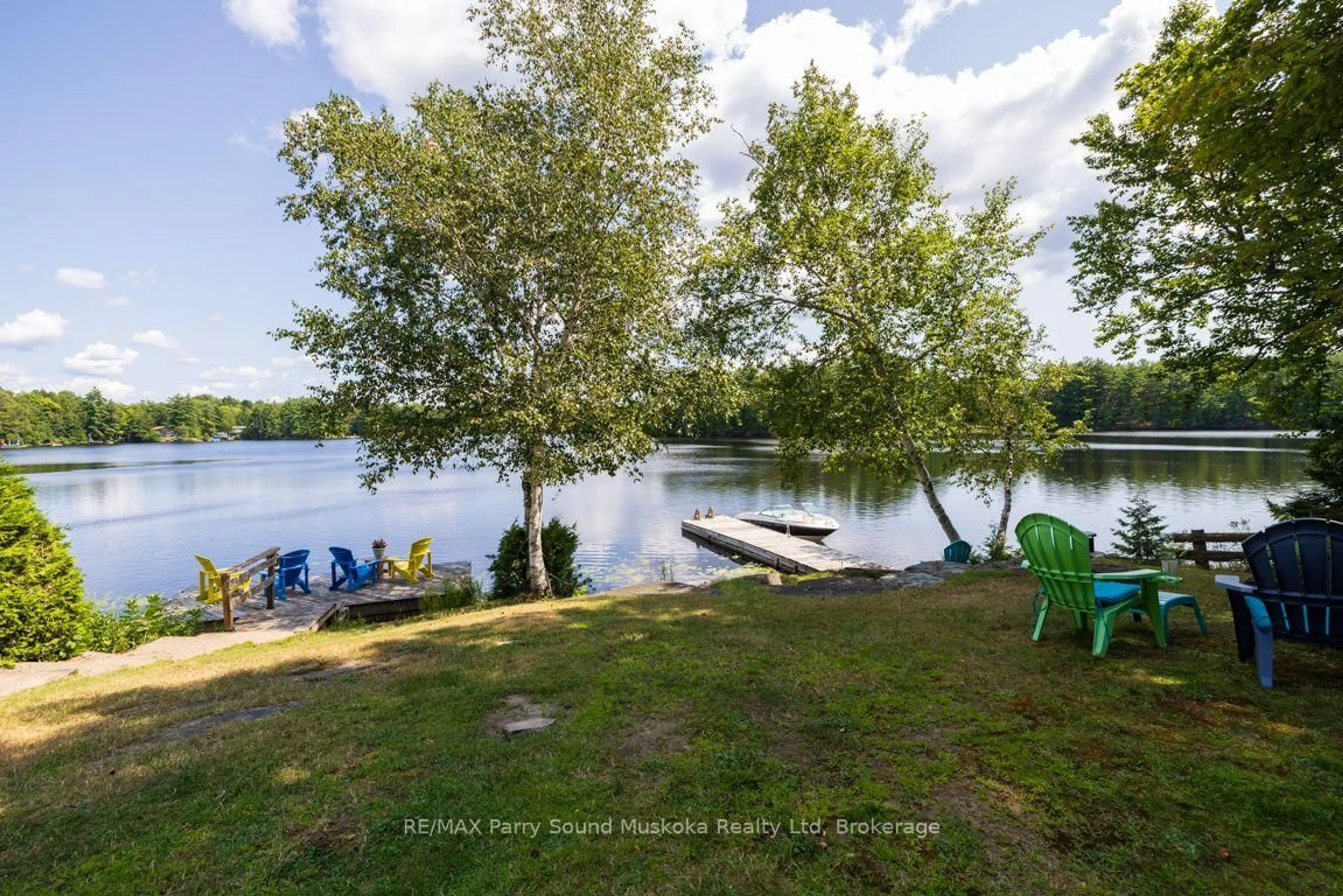 A pic from outside/outdoor area/front of a property/back of a property/a pic from drone, water/lake/river/ocean view for 18 Maple Tr, McDougall Ontario P2A 2W7