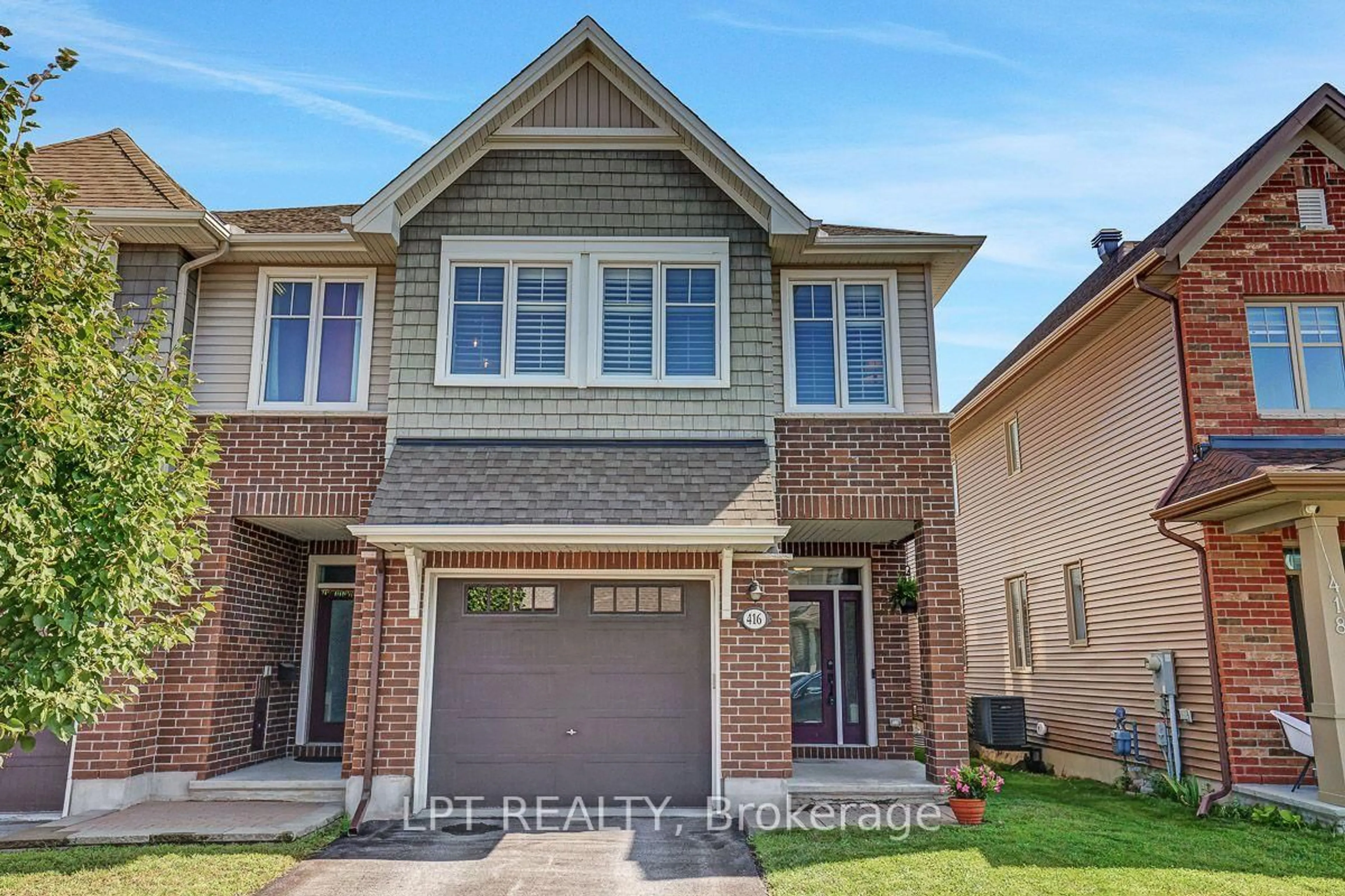 Home with brick exterior material, street for 416 Warmstone Dr, Stittsville Ontario K2S 0W2
