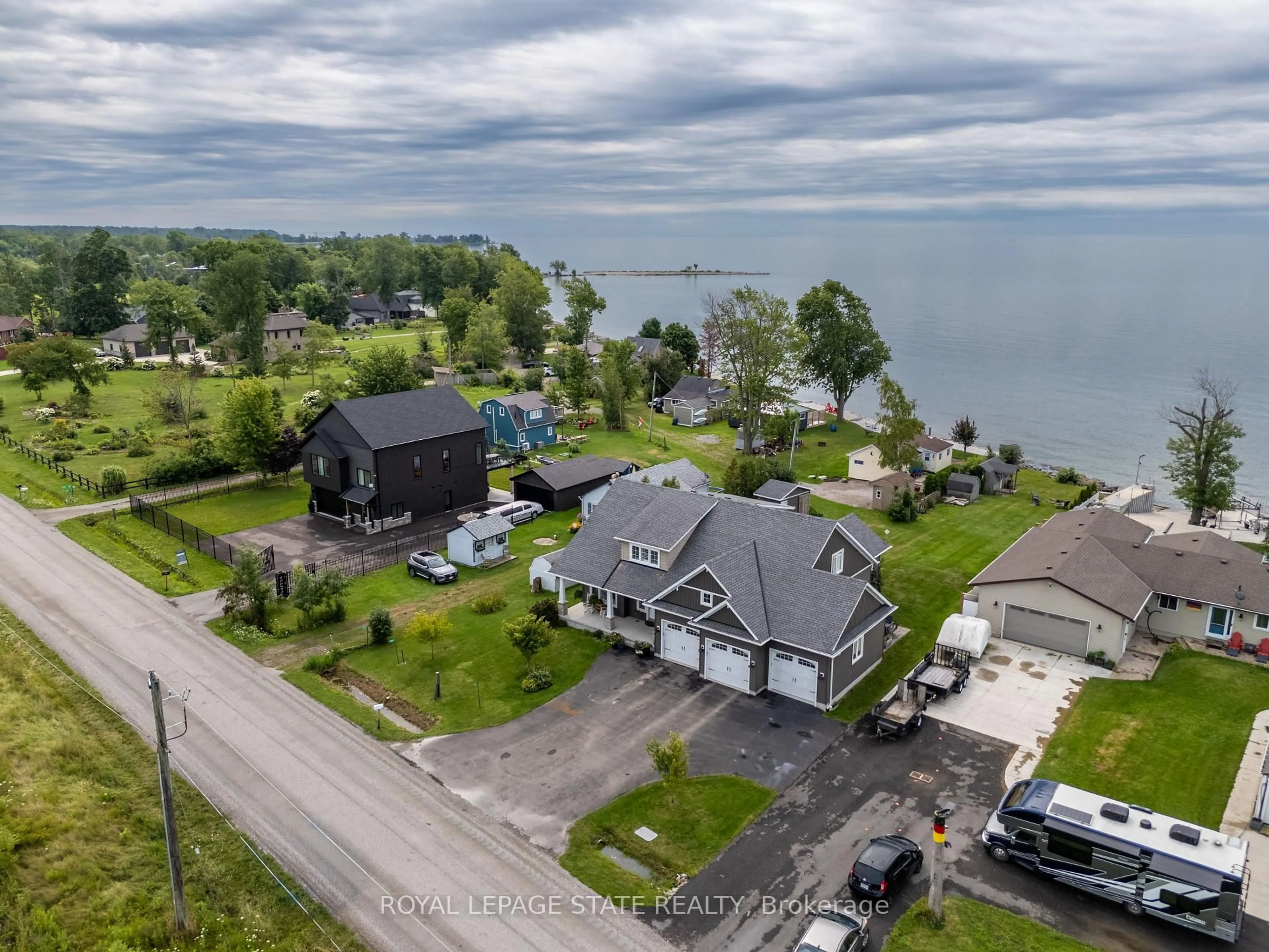 A pic from outside/outdoor area/front of a property/back of a property/a pic from drone, water/lake/river/ocean view for 3176 Lakeshore Rd, Haldimand Ontario N1A 2W8