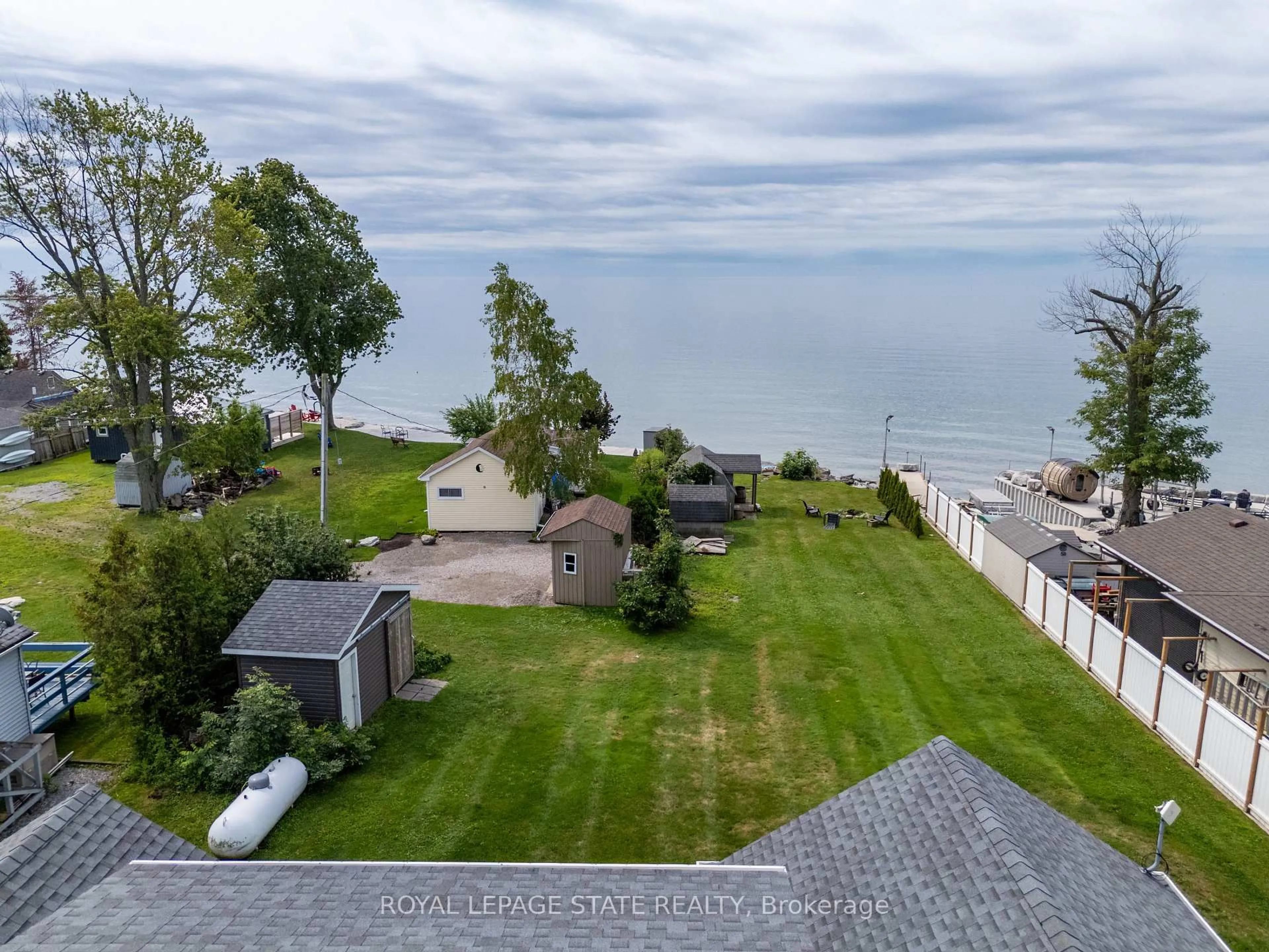 A pic from outside/outdoor area/front of a property/back of a property/a pic from drone, water/lake/river/ocean view for 3176 Lakeshore Rd, Haldimand Ontario N1A 2W8