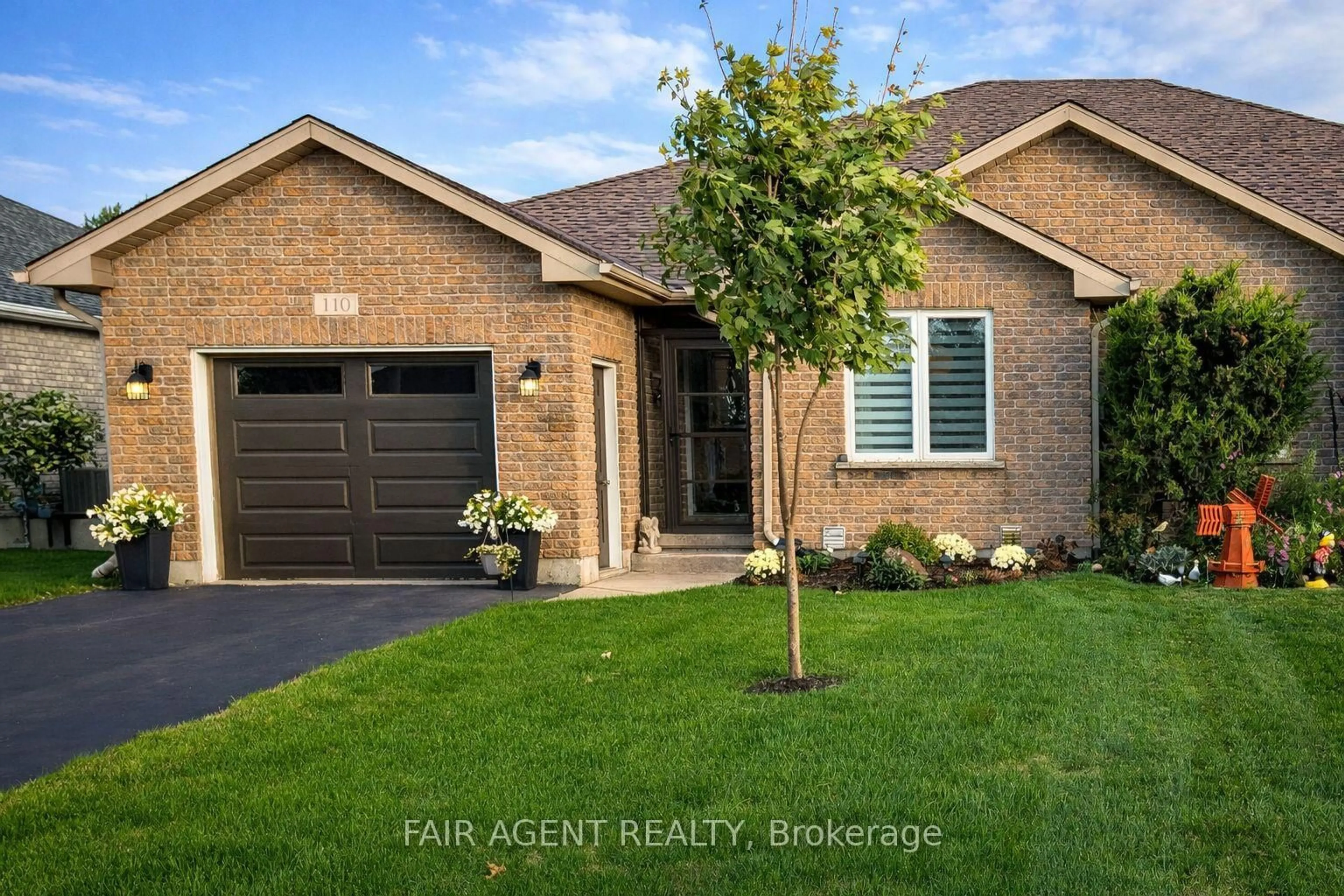 Home with brick exterior material, street for 110 MILTON SEILER Cres, Minto Ontario N0G 2P0