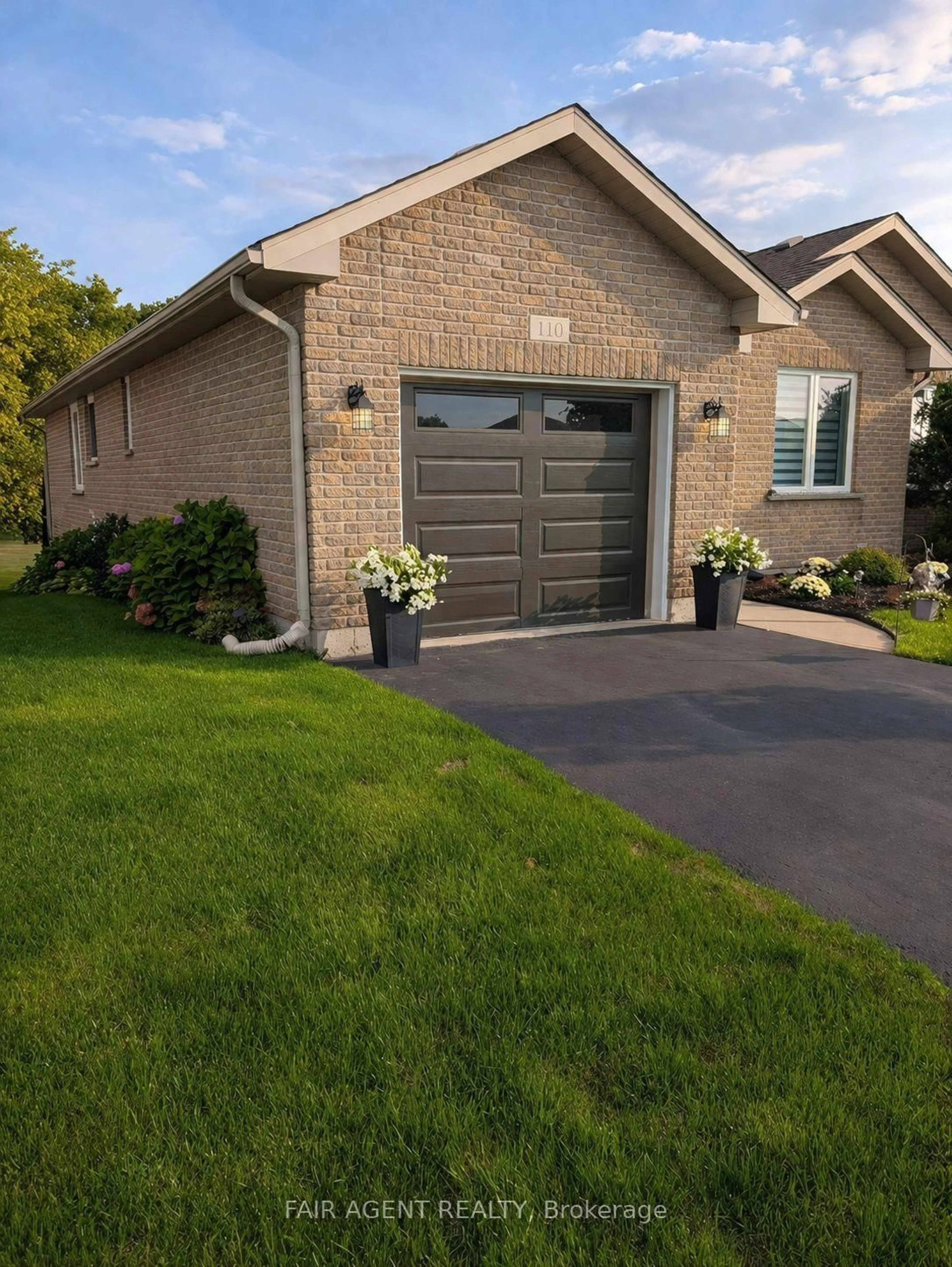 Home with vinyl exterior material, street for 110 MILTON SEILER Cres, Minto Ontario N0G 2P0