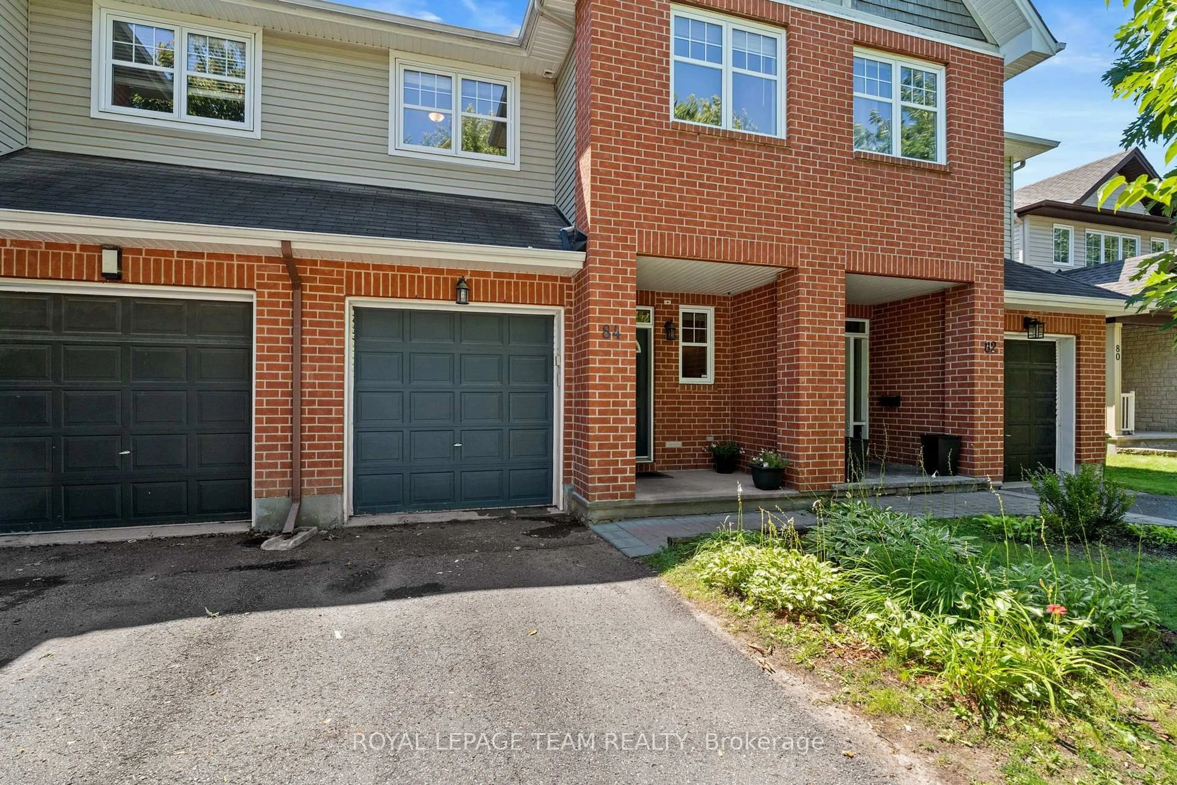 Home with brick exterior material, street for 84 Selhurst Ave, Ottawa Ontario K2G 7C9