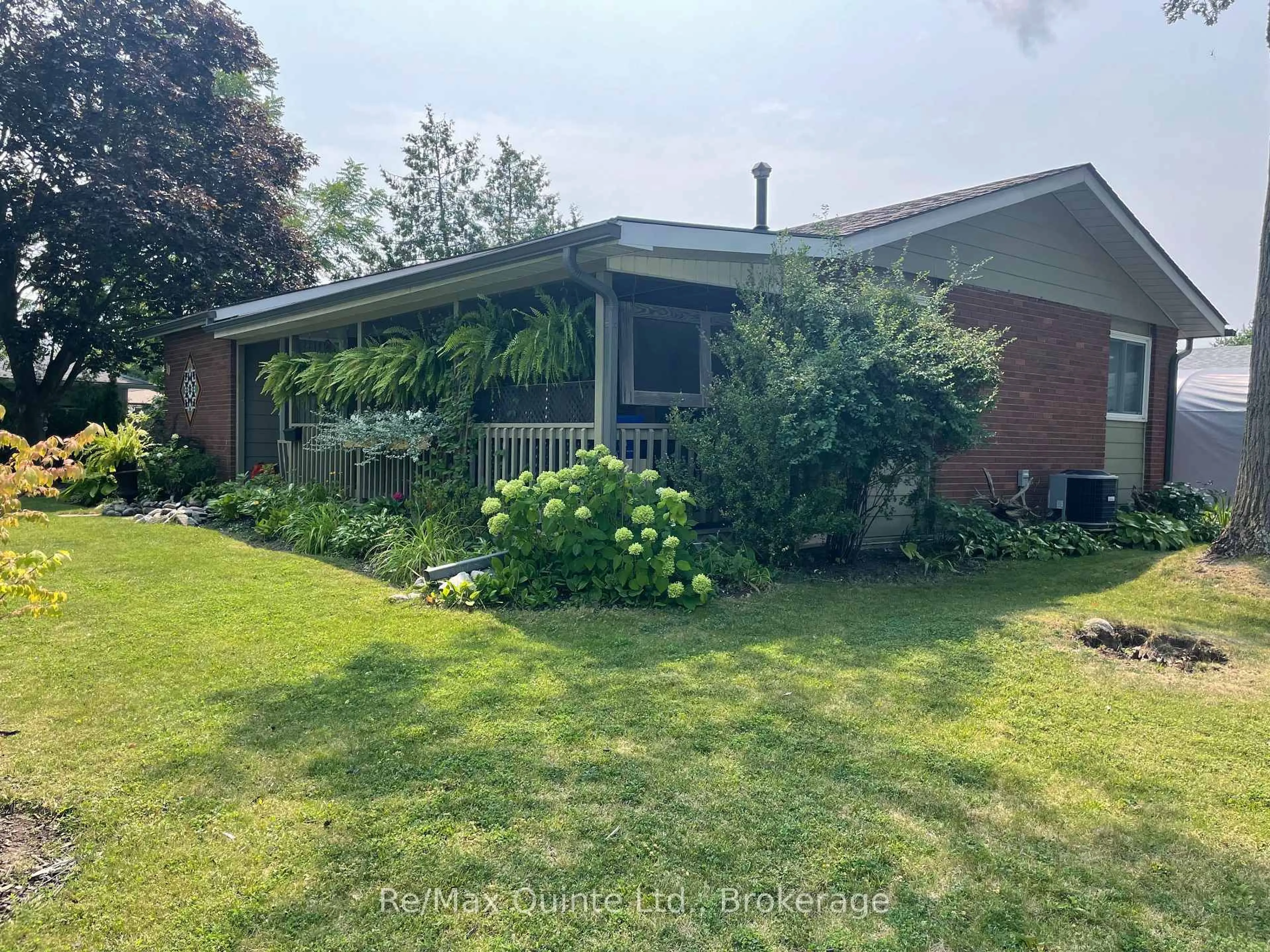 A pic from outside/outdoor area/front of a property/back of a property/a pic from drone, water/lake/river/ocean view for 10 Mcquade Dr, Quinte West Ontario K8V 2G3