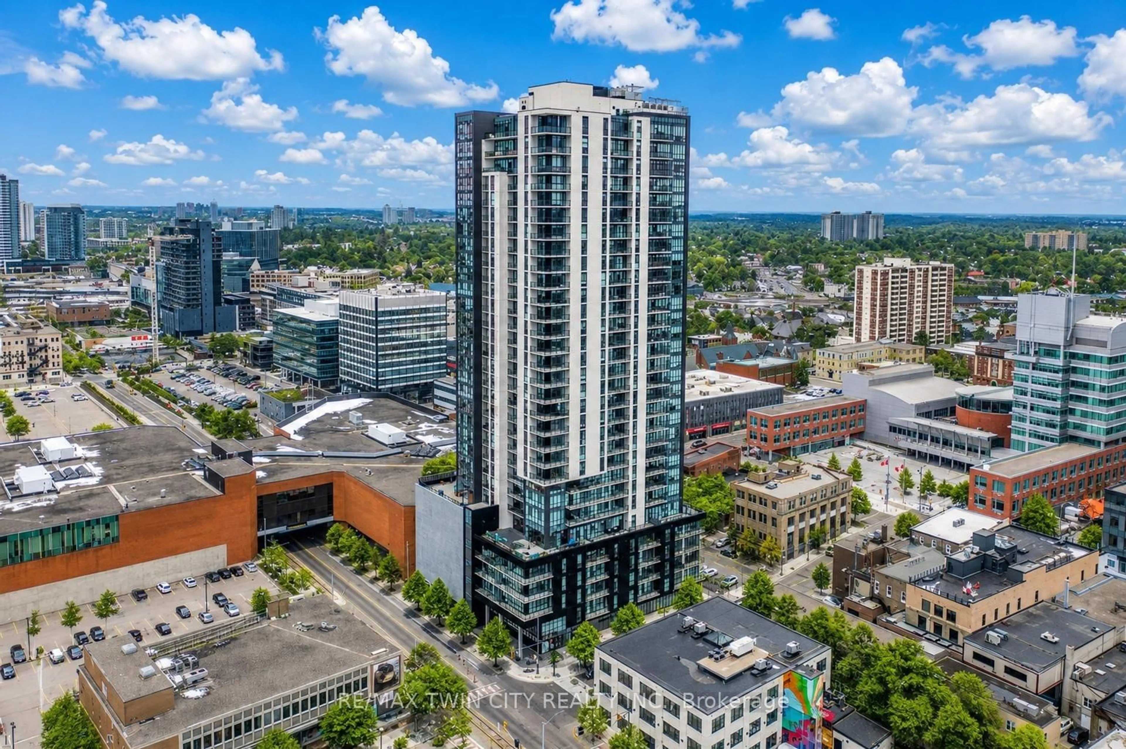 A pic from outside/outdoor area/front of a property/back of a property/a pic from drone, city buildings view from balcony for 60 Charles St #1402, Kitchener Ontario N2G 0C9