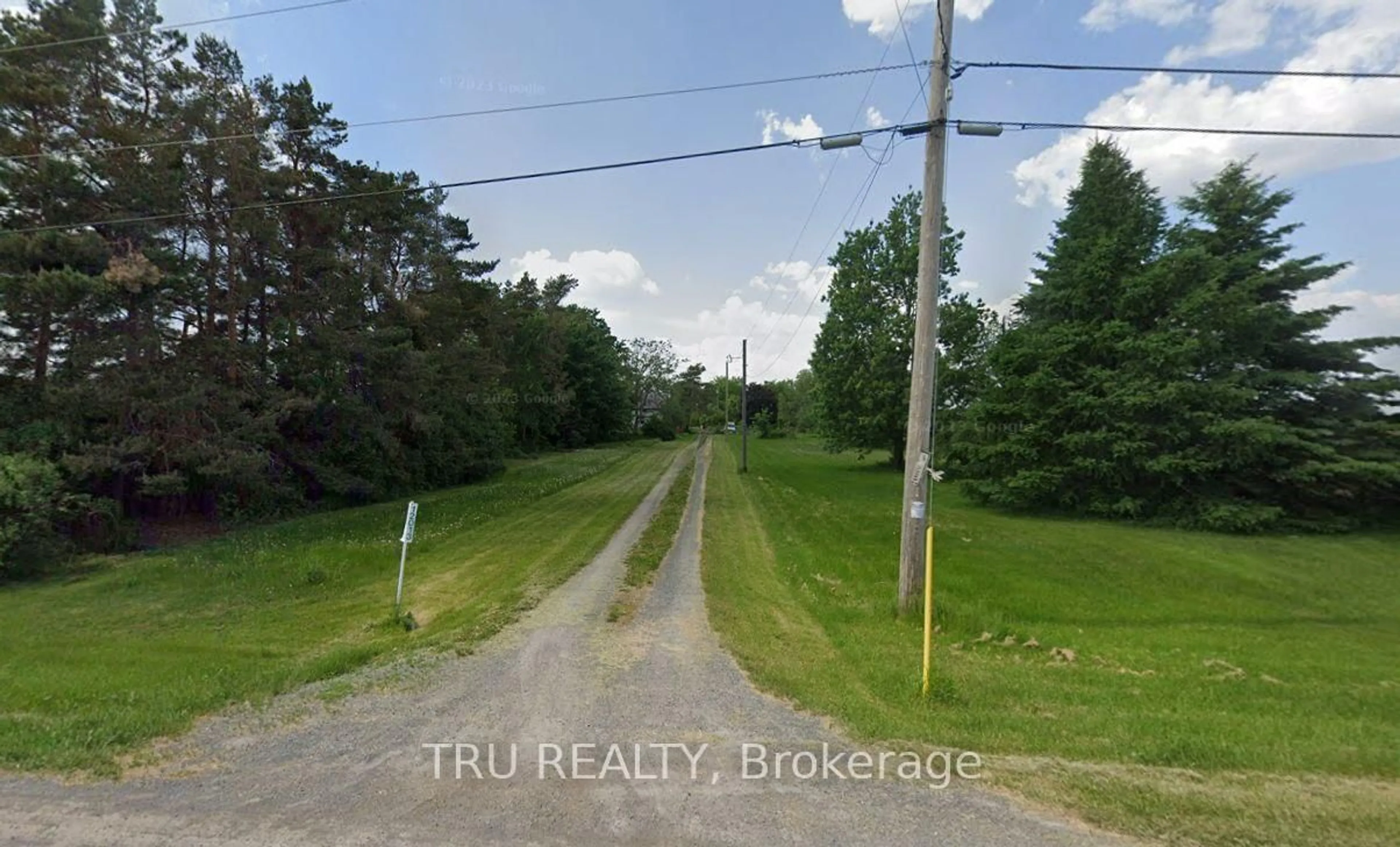 A pic from outside/outdoor area/front of a property/back of a property/a pic from drone, street for 12013 Hogaboam Rd, North Dundas Ontario K0E 1J0