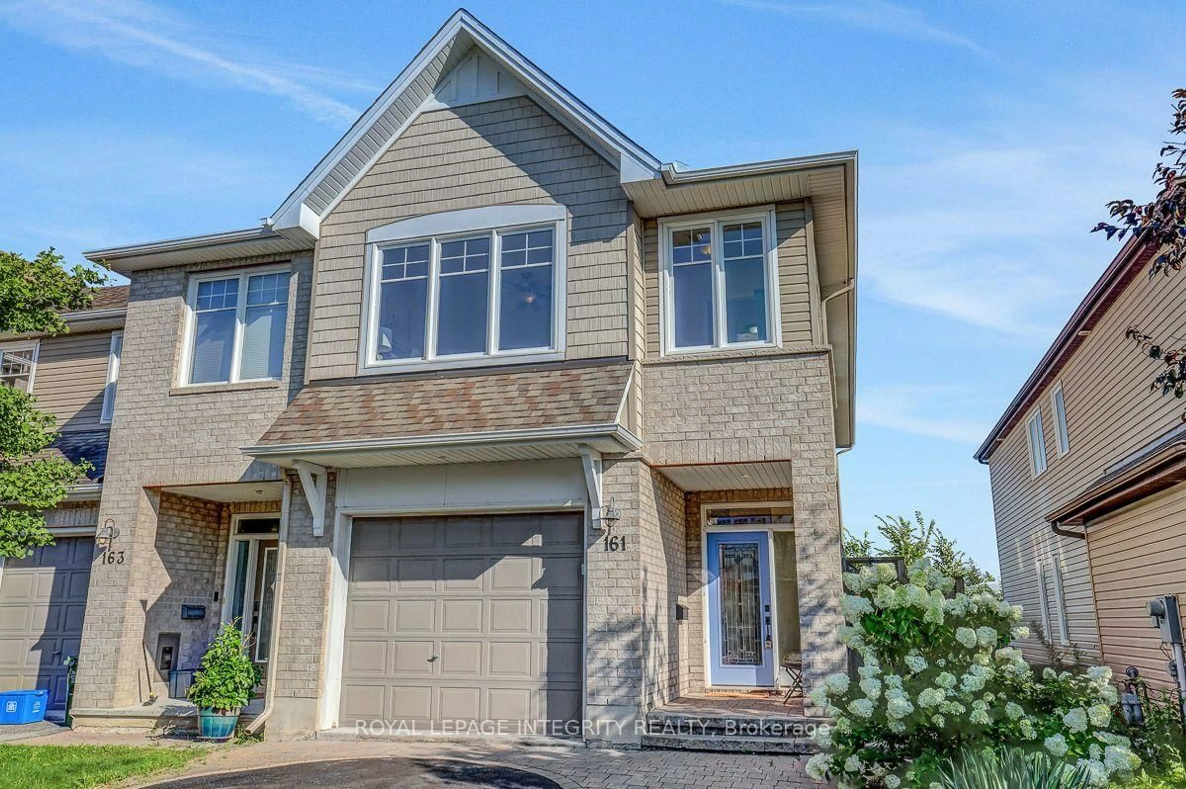 Home with vinyl exterior material, street for 161 Mojave Cres, Ottawa Ontario K2S 0H3