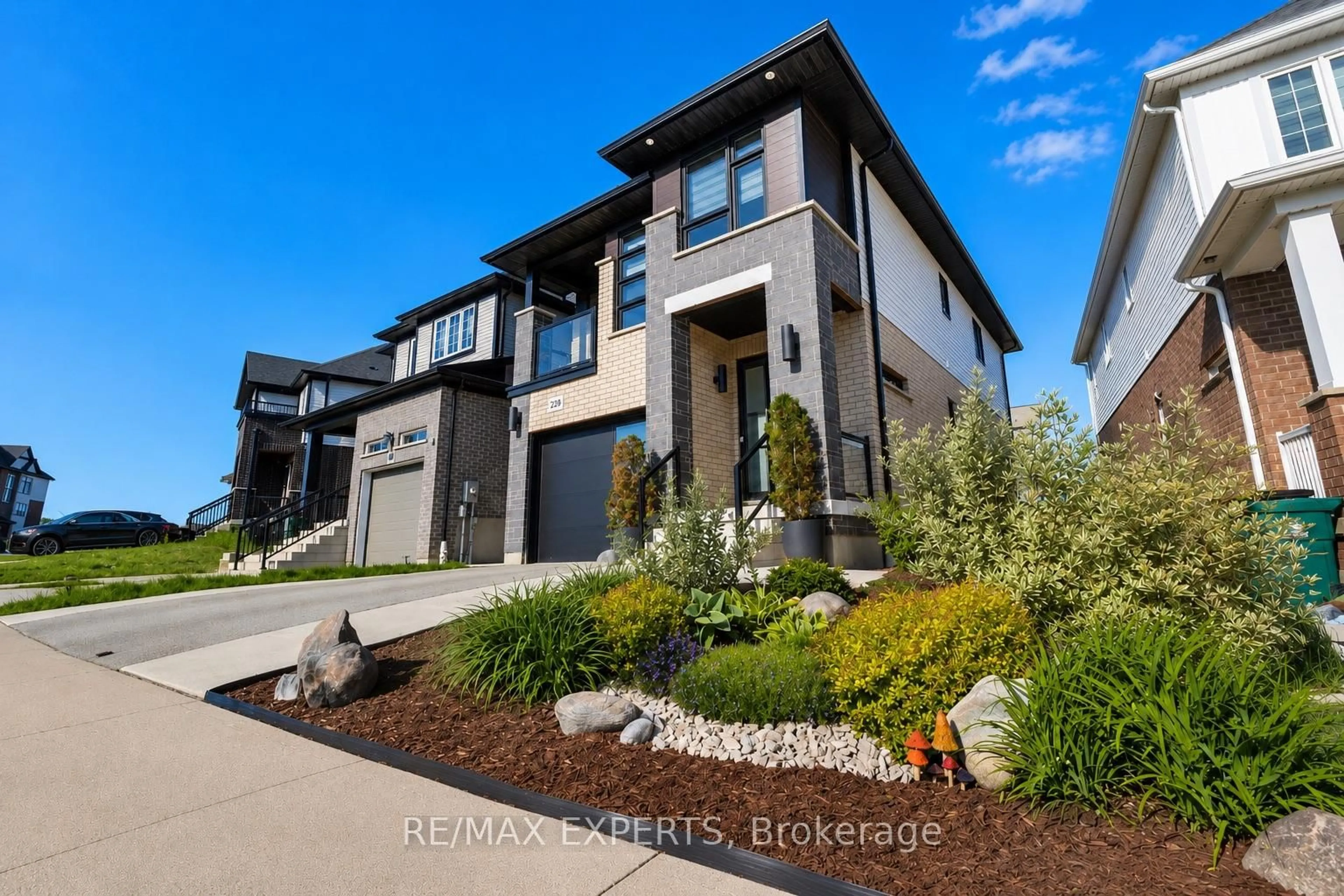 Home with brick exterior material, street for 228 Woodbine Ave, Kitchener Ontario N2R 1Y5