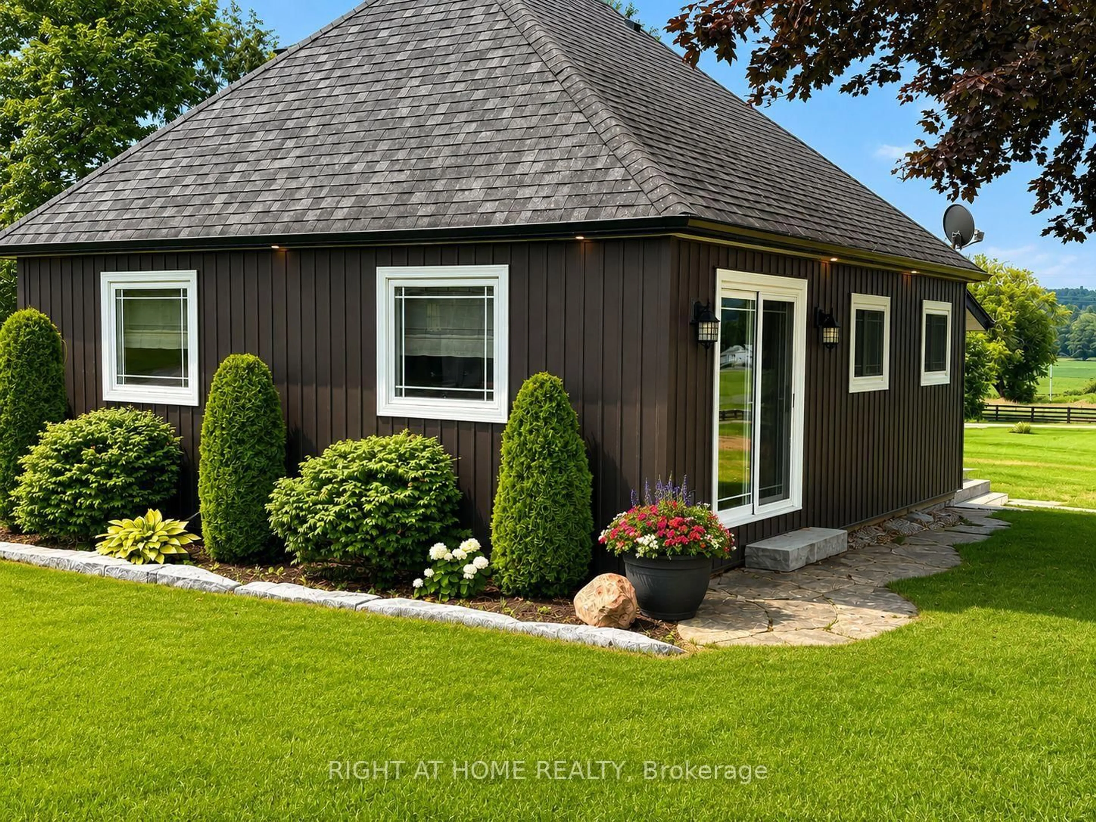 Home with vinyl exterior material, street for 8181A Cavan Rd, Hamilton Township Ontario K0K 2E0
