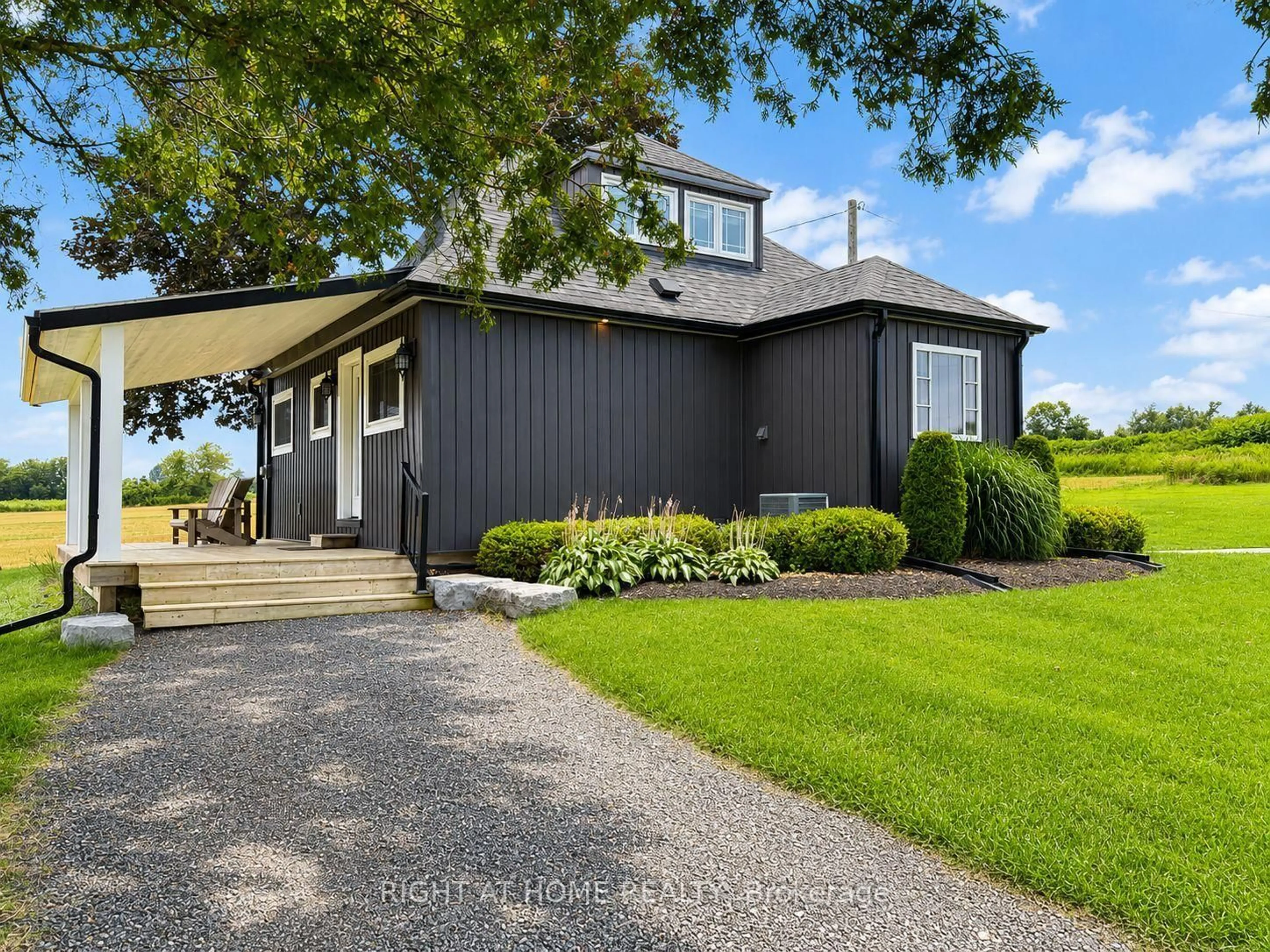 Home with vinyl exterior material, street for 8181A Cavan Rd, Hamilton Township Ontario K0K 2E0
