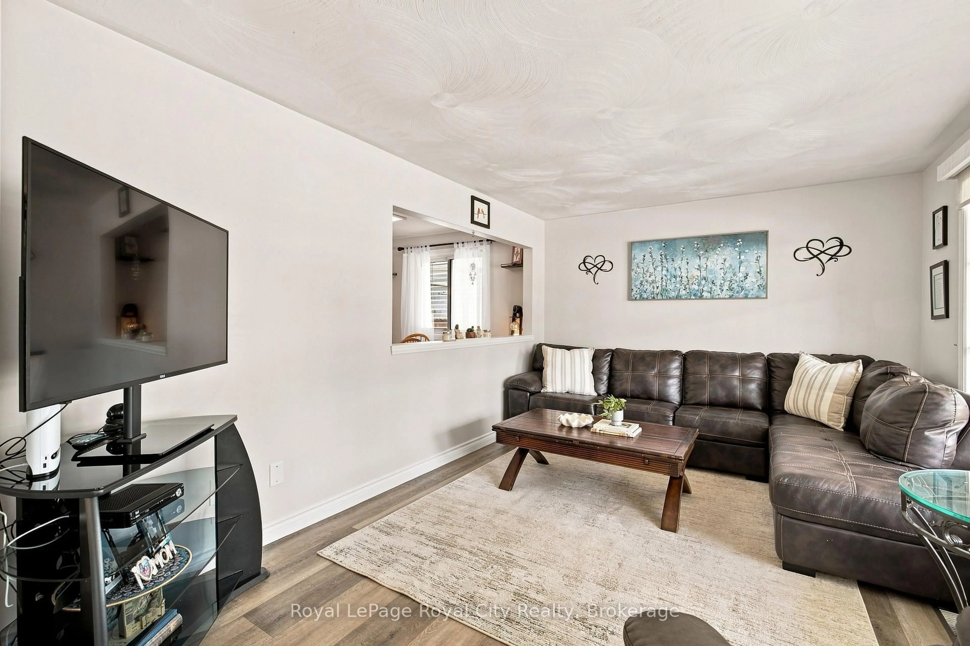 Living room with furniture, unknown for 27 Carey Cres, Guelph Ontario N1H 7J9