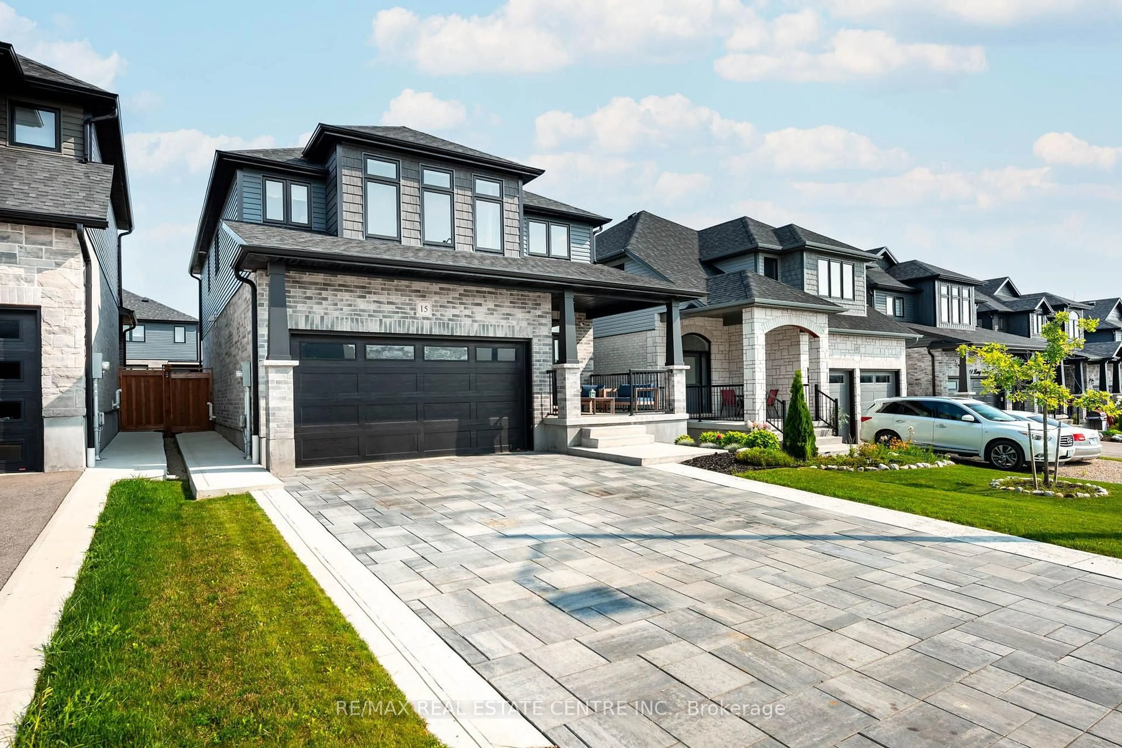Home with brick exterior material, street for 15 Lang Lane, East Luther Grand Valley Ontario L9W 7S7