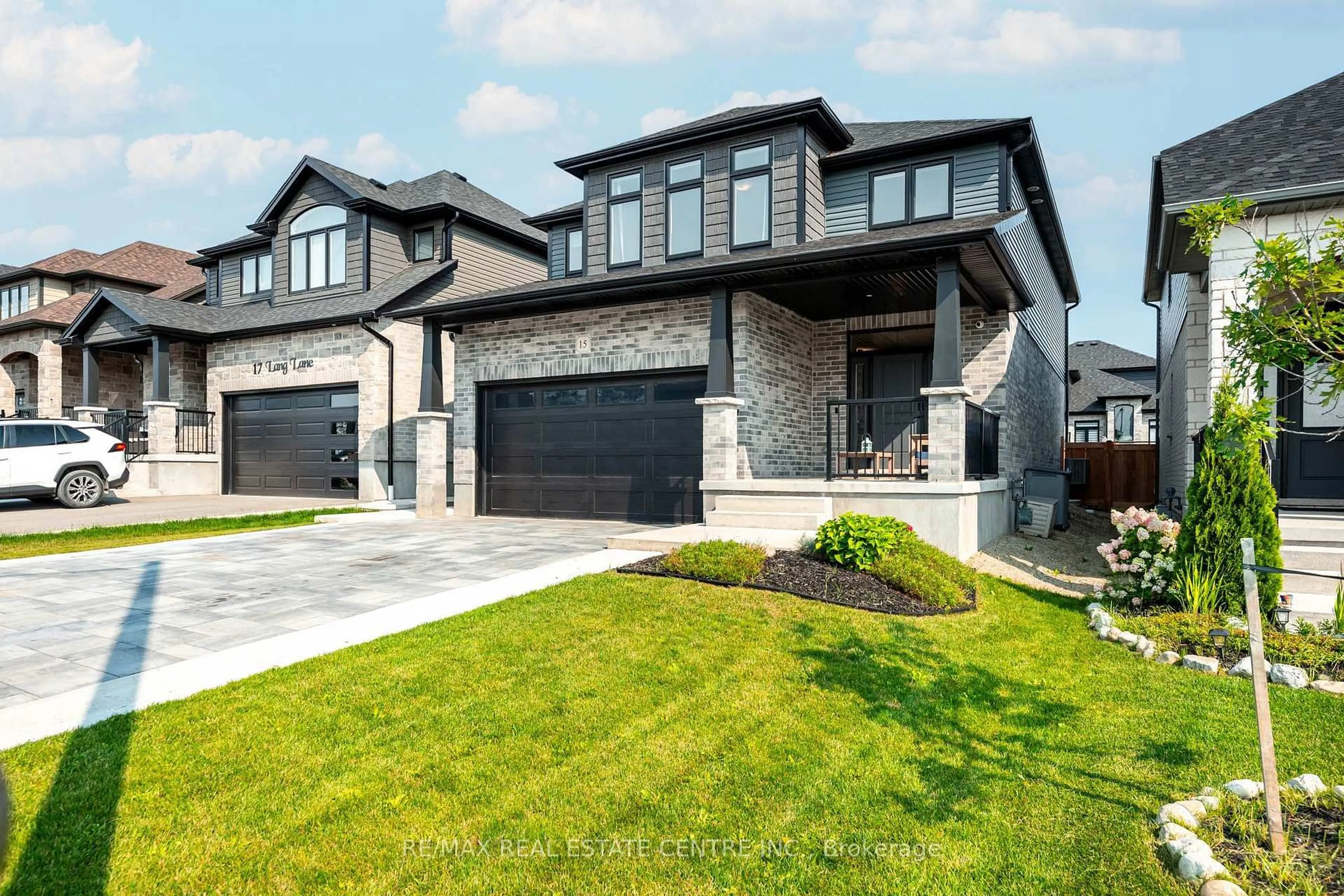 Home with brick exterior material, street for 15 Lang Lane, East Luther Grand Valley Ontario L9W 7S7