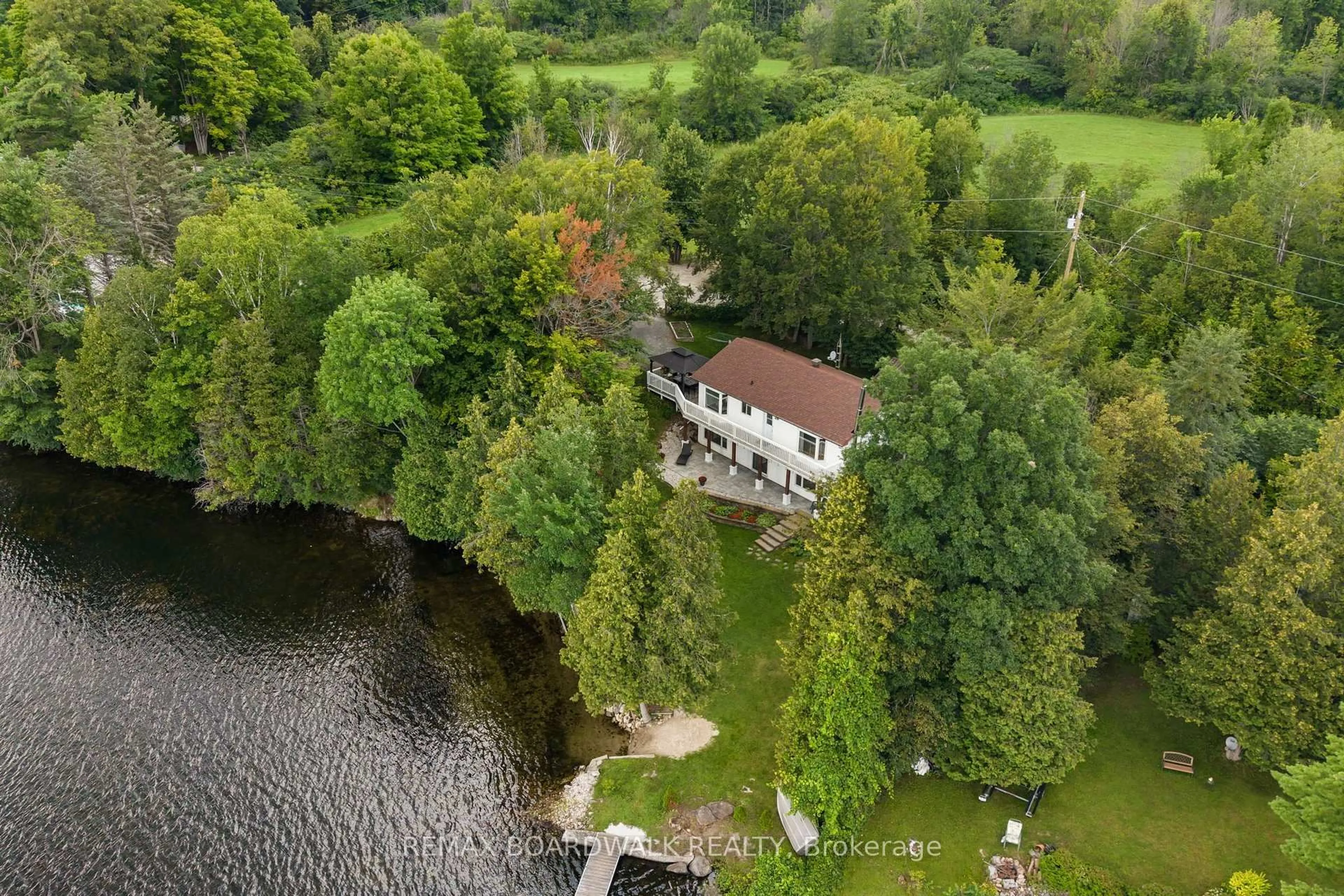 A pic from outside/outdoor area/front of a property/back of a property/a pic from drone, water/lake/river/ocean view for 125 Pike Lake Route 11 Rd, Perth Ontario K7H 3C5