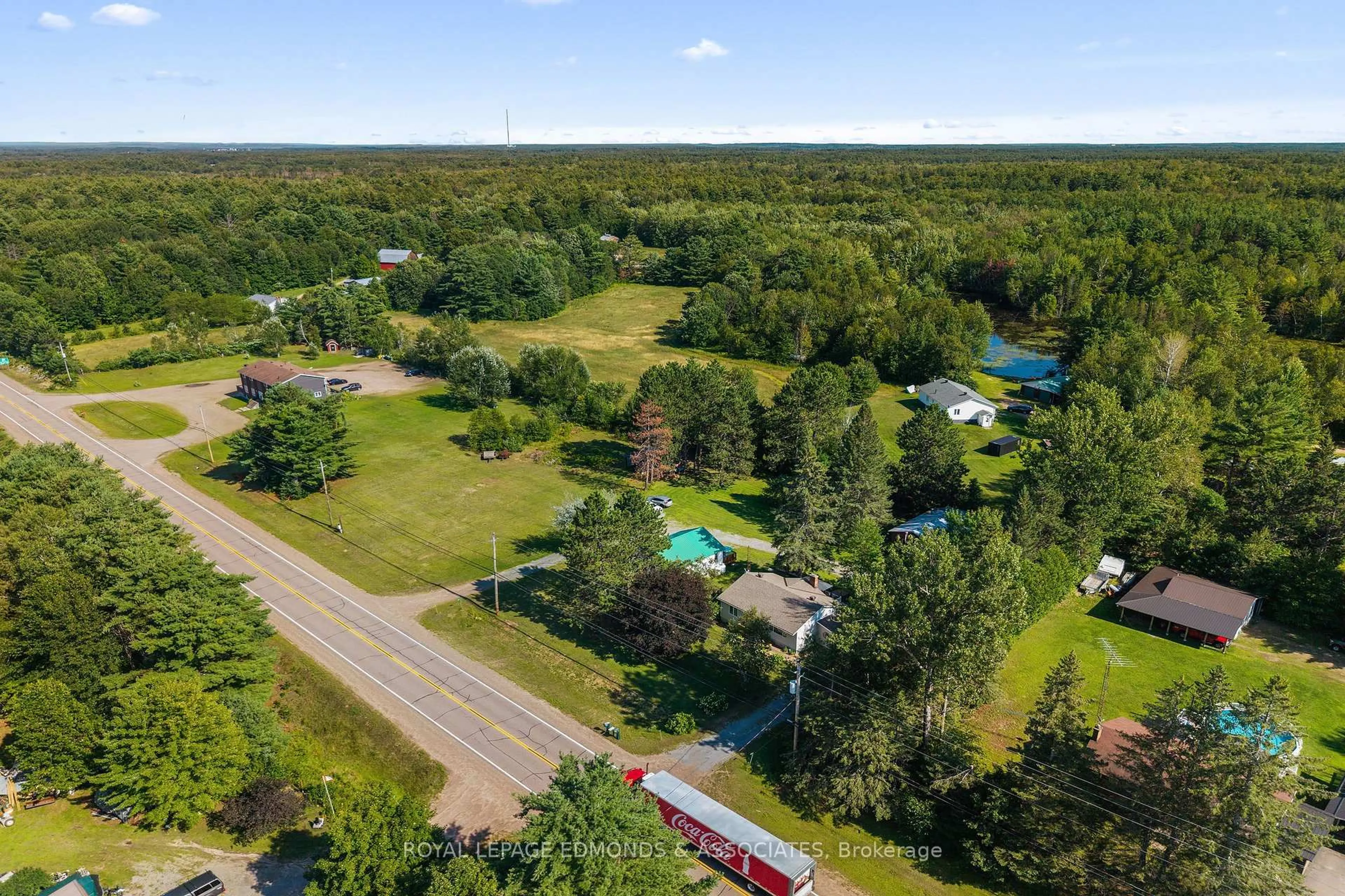 A pic from outside/outdoor area/front of a property/back of a property/a pic from drone, water/lake/river/ocean view for 11132 & 11140 Round Lake Rd, Pembroke Ontario K8A 6W8