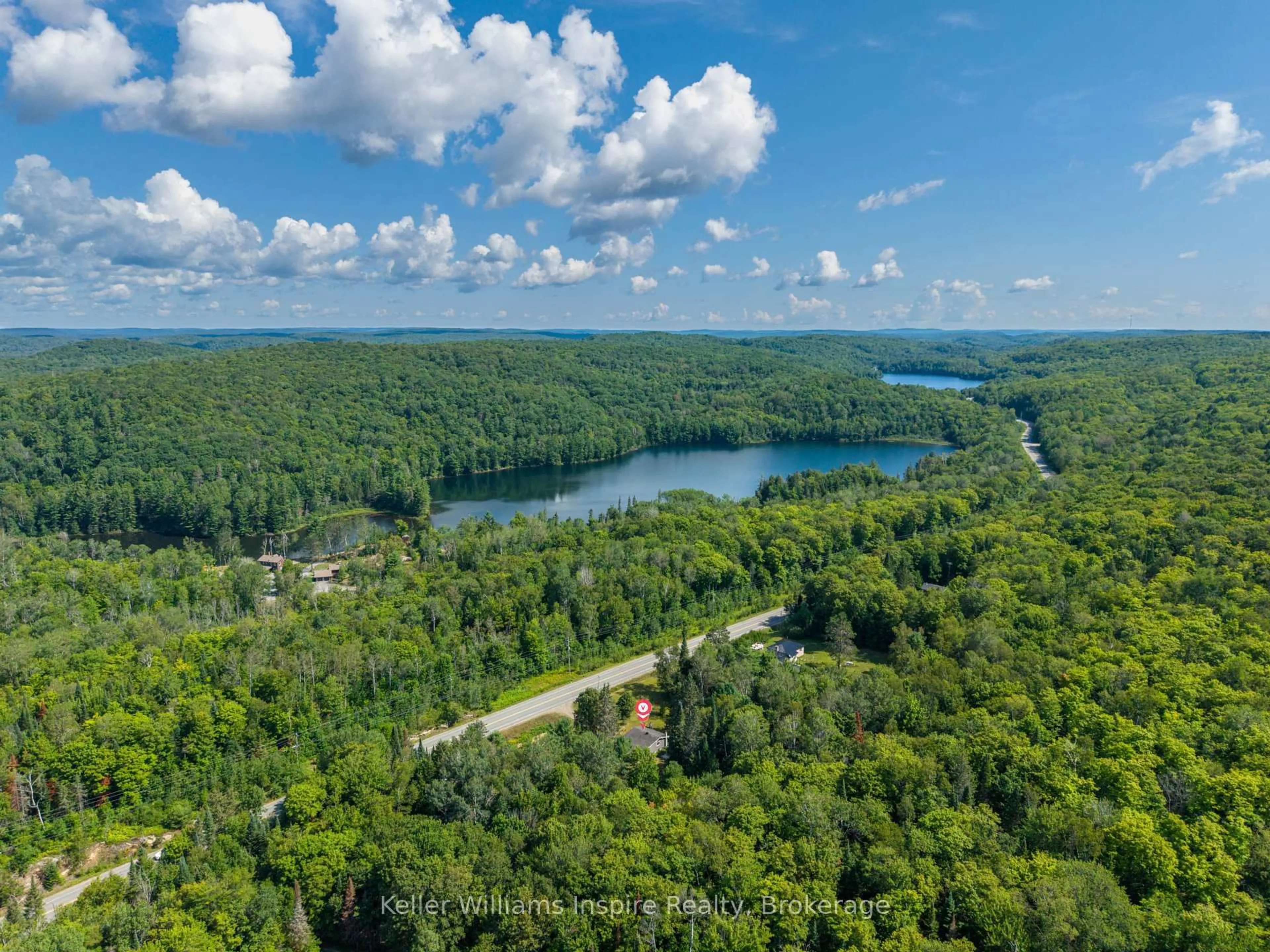 A pic from outside/outdoor area/front of a property/back of a property/a pic from drone, water/lake/river/ocean view for 3044 LOOP Rd, Highlands East Ontario K0L 3C0