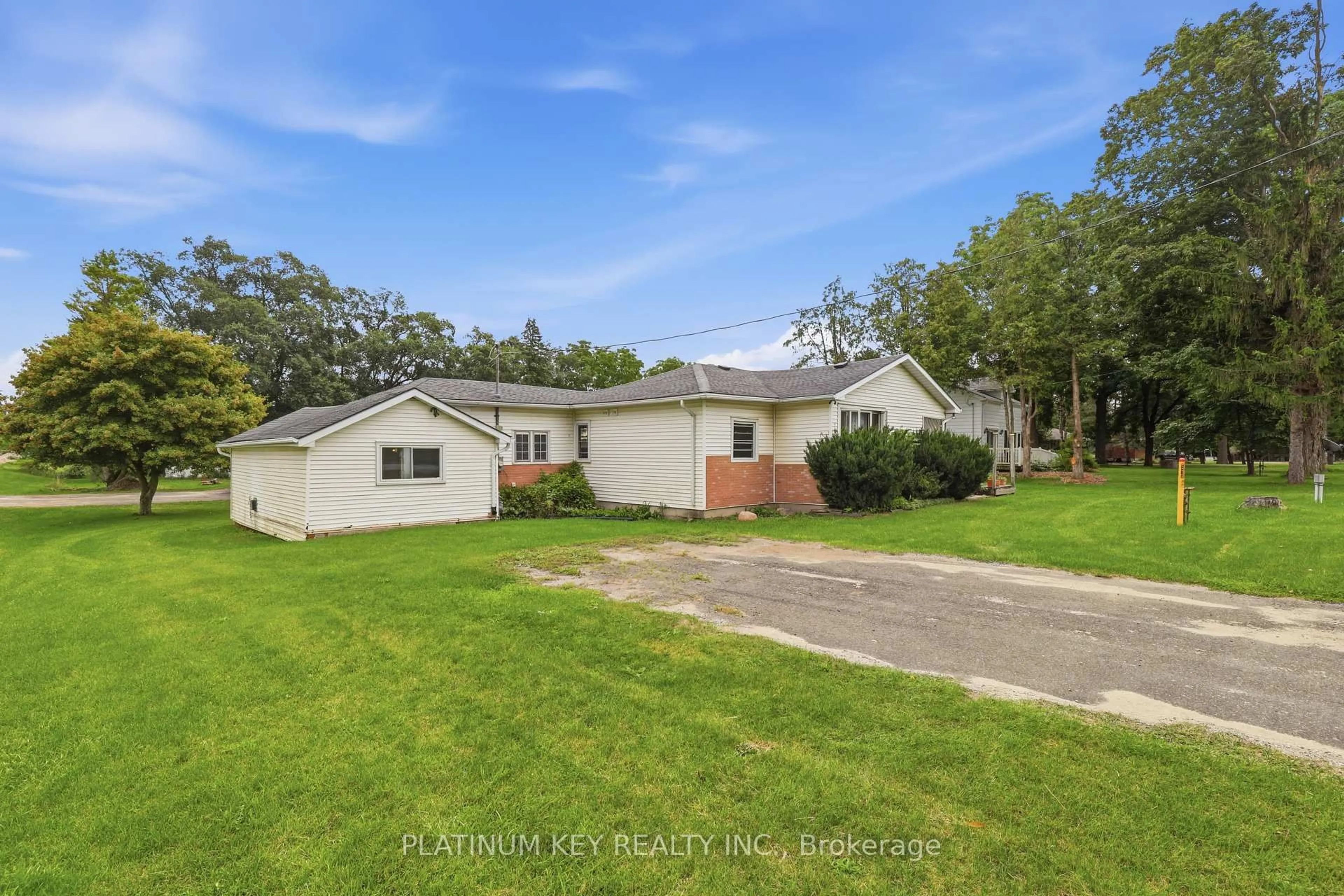 A pic from outside/outdoor area/front of a property/back of a property/a pic from drone, street for 22942 Wonderland Rd, Middlesex Centre Ontario N0M 2A0