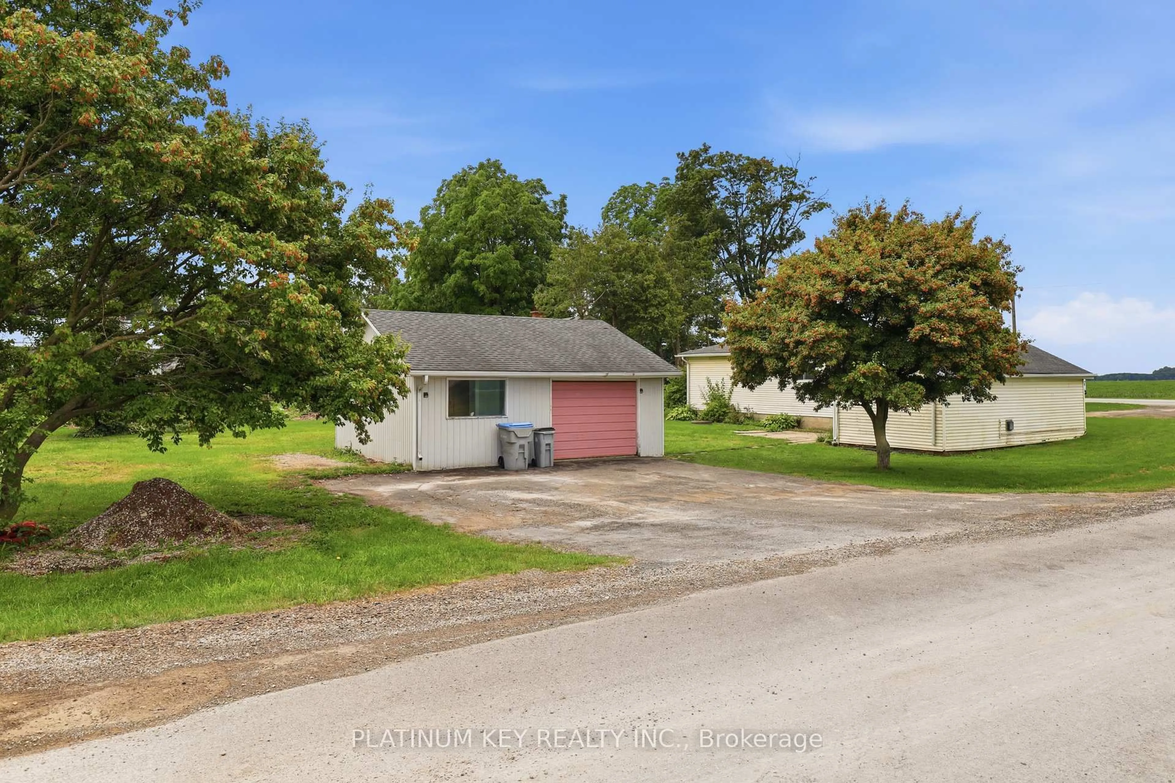 A pic from outside/outdoor area/front of a property/back of a property/a pic from drone, street for 22942 Wonderland Rd, Middlesex Centre Ontario N0M 2A0