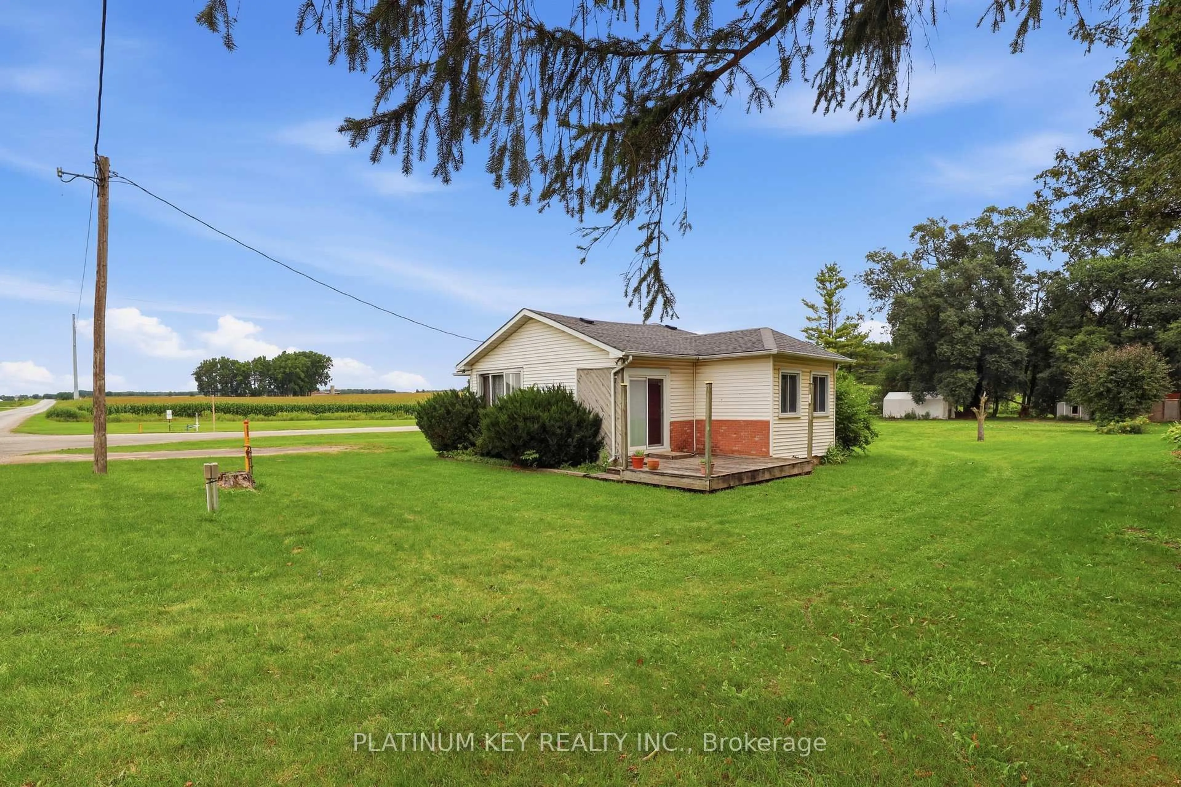 A pic from outside/outdoor area/front of a property/back of a property/a pic from drone, water/lake/river/ocean view for 22942 Wonderland Rd, Middlesex Centre Ontario N0M 2A0
