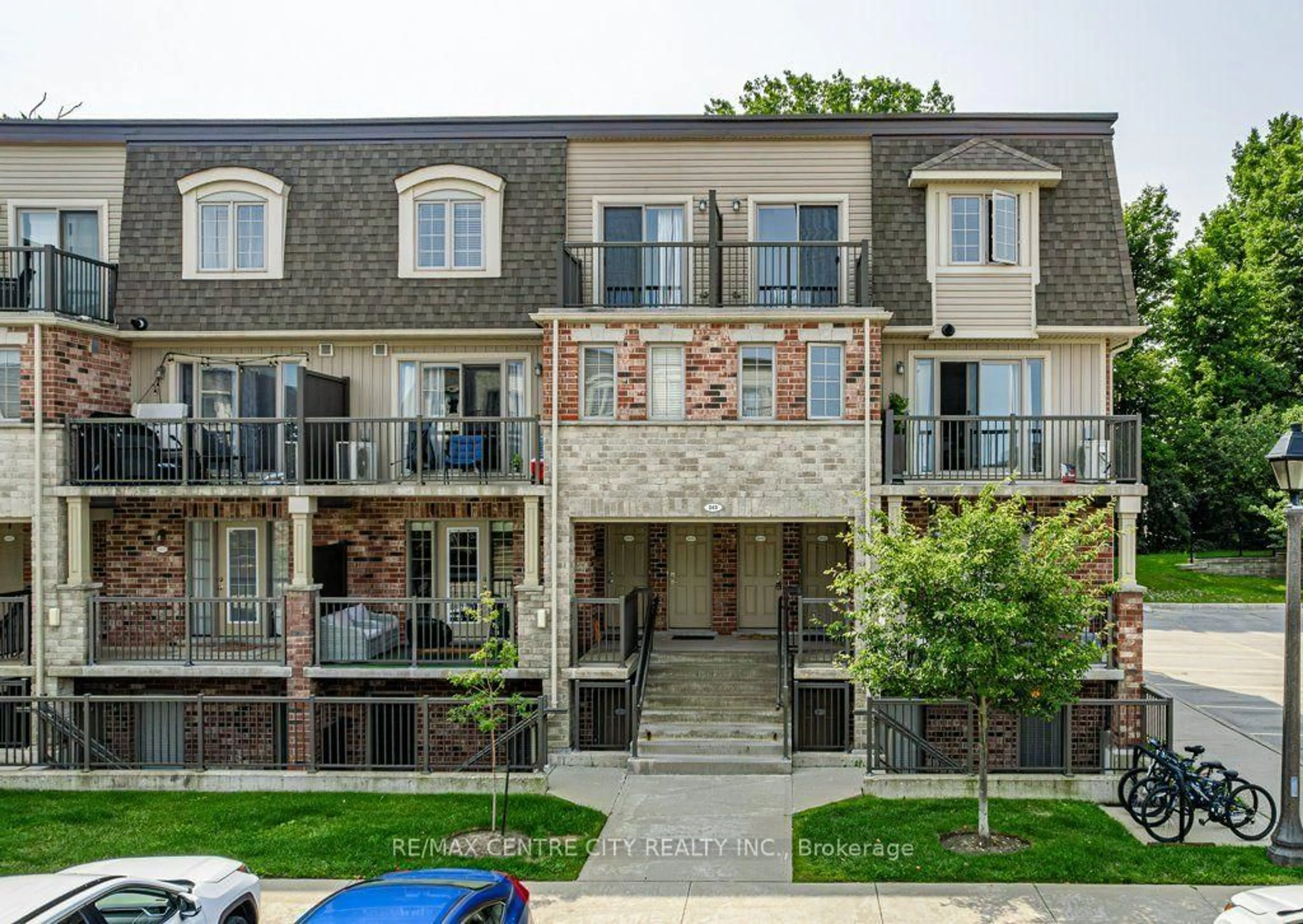 Home with brick exterior material, street for 243 Rachel Cres #D, Kitchener Ontario N2R 0E2