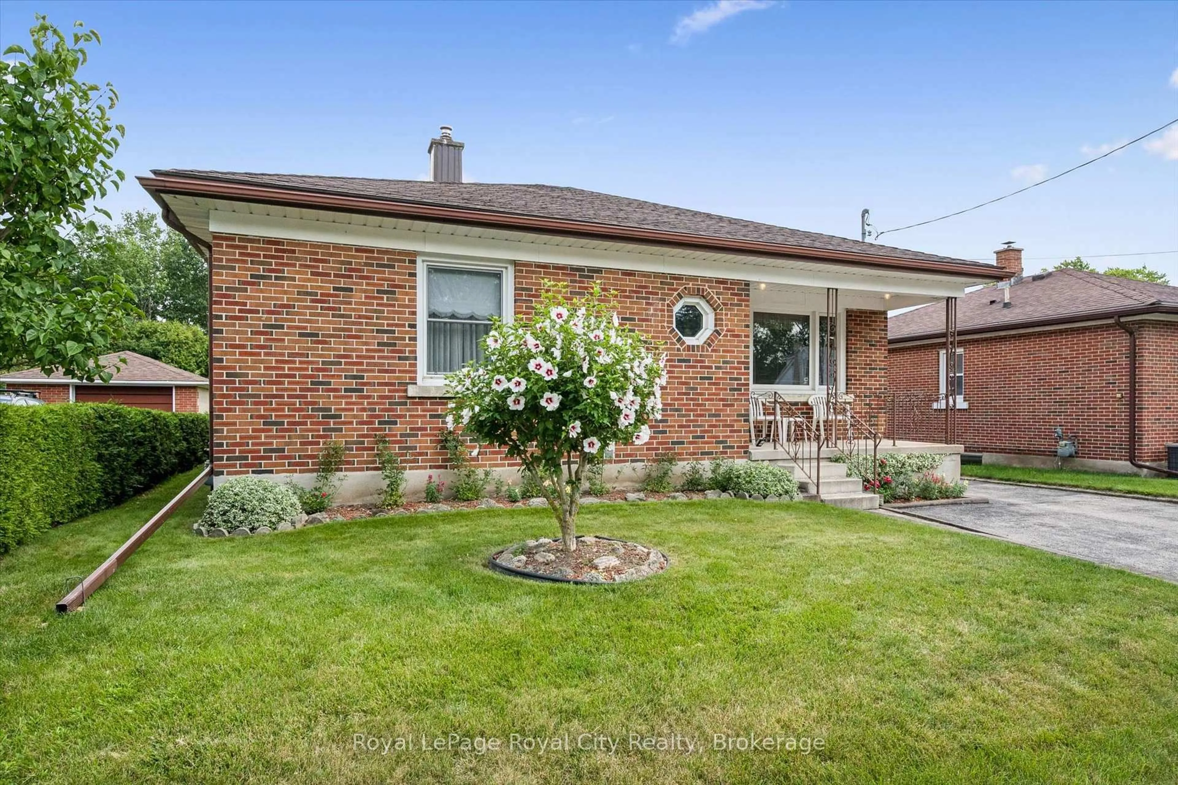 Home with brick exterior material, street for 133 Emma St, Guelph Ontario N1E 1V2