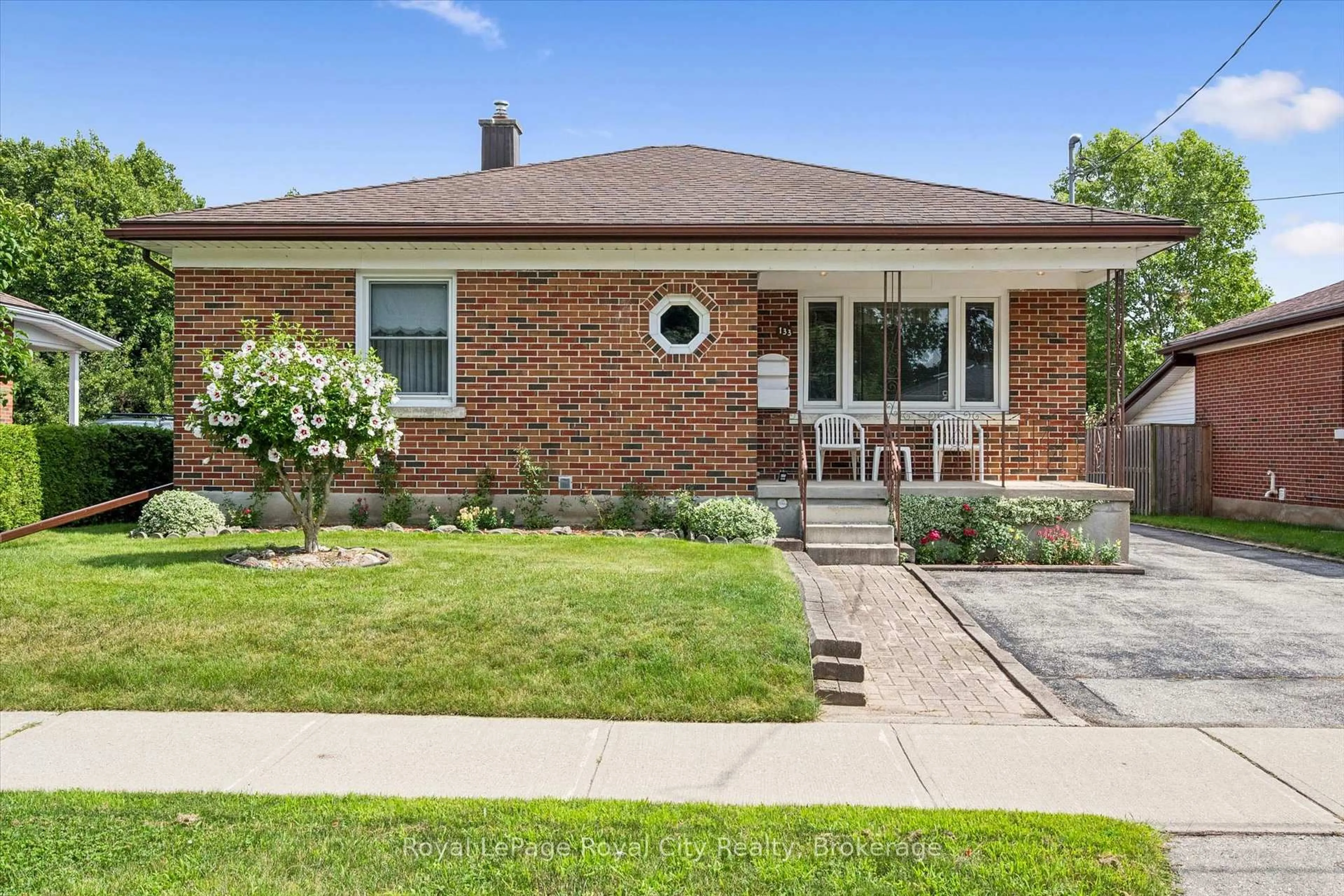 Home with brick exterior material, street for 133 Emma St, Guelph Ontario N1E 1V2