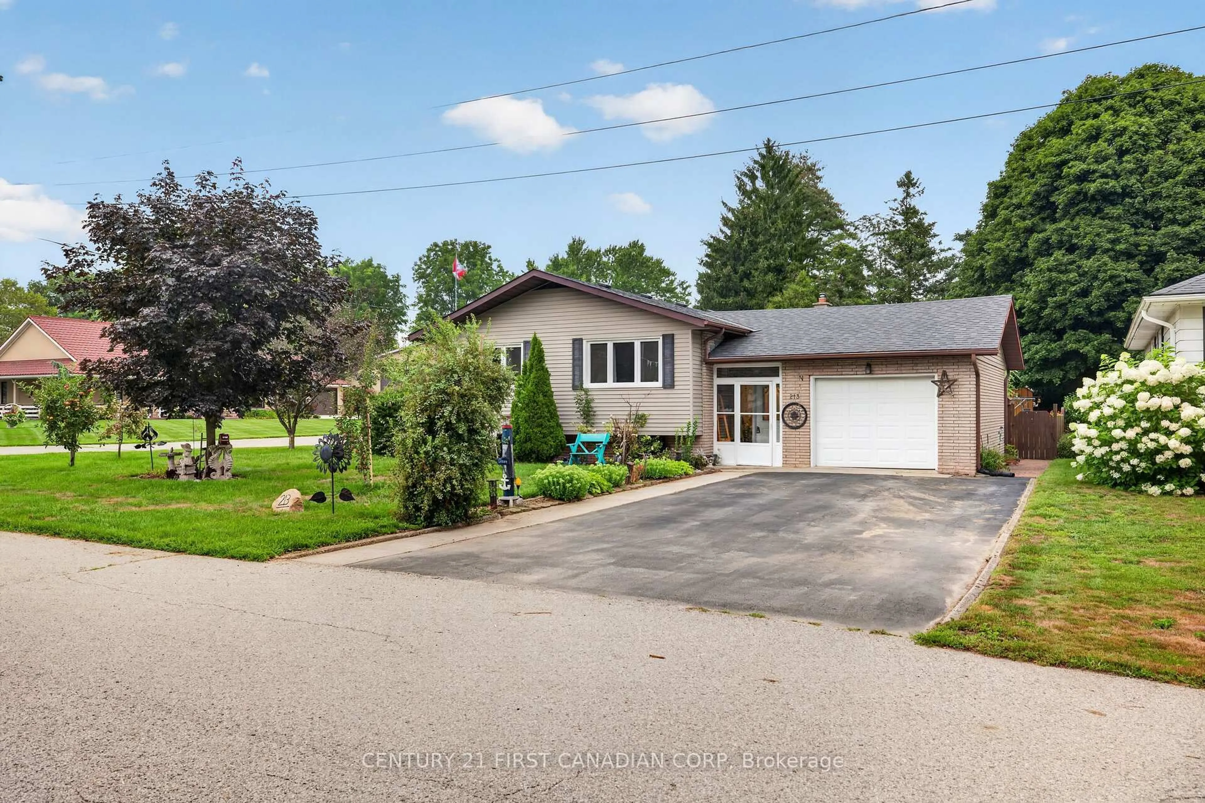 A pic from outside/outdoor area/front of a property/back of a property/a pic from drone, street for 213 Fourth St, West Elgin Ontario N0L 2C0