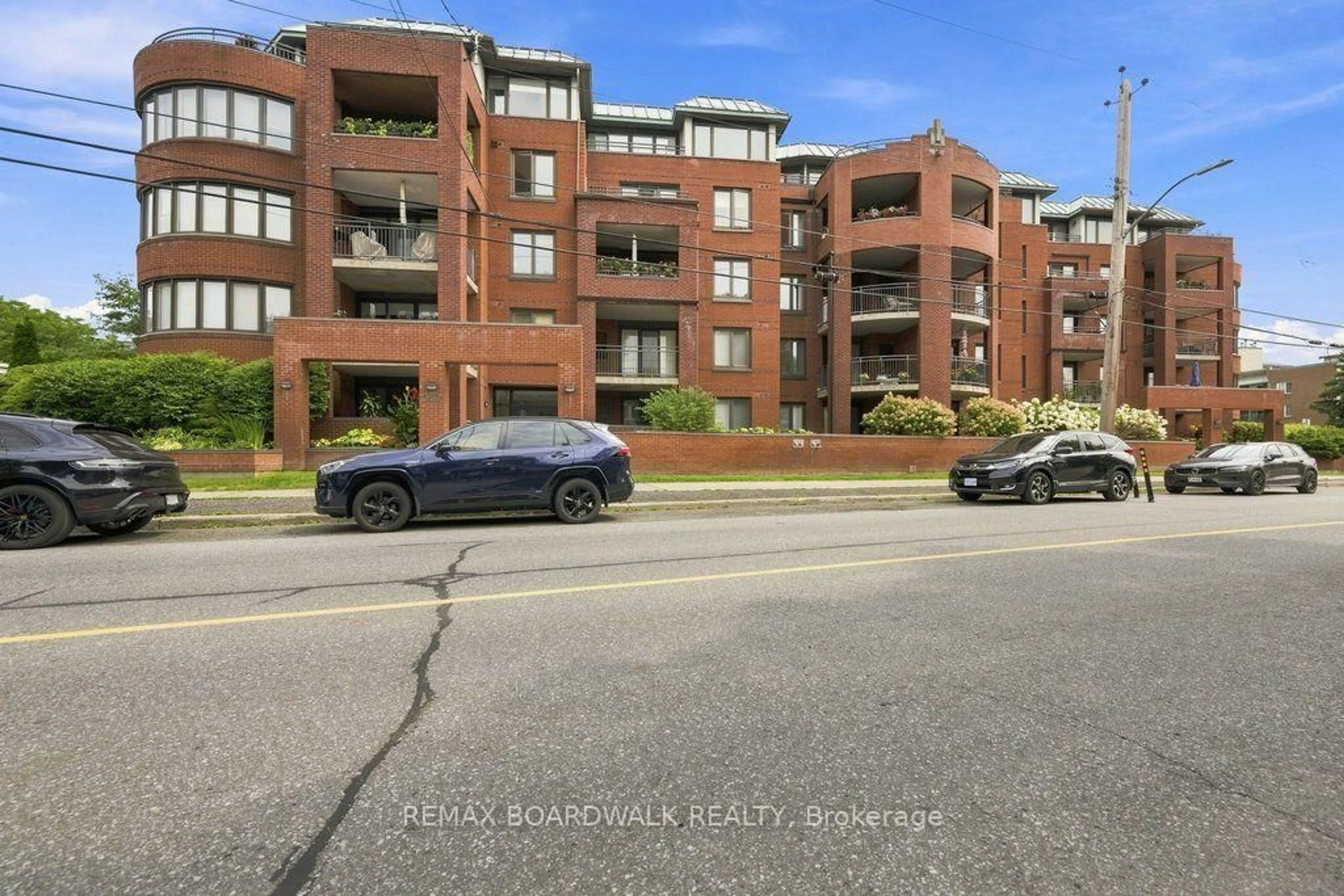 A pic from outside/outdoor area/front of a property/back of a property/a pic from drone, street for 959 North River Rd #307, Ottawa Ontario K1K 3V3
