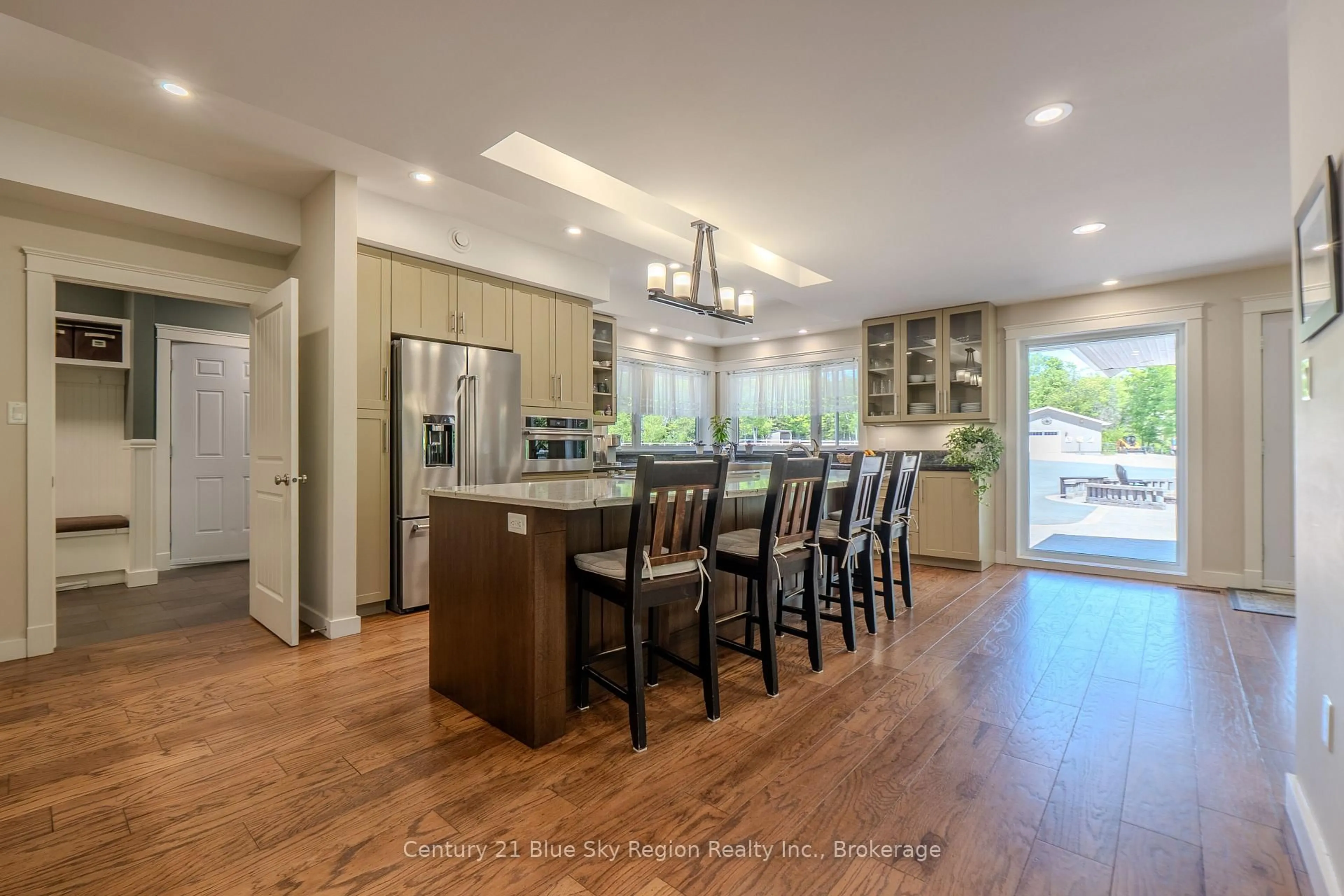 Open concept kitchen, wood/laminate floor for 395 Carmichael Dr, North Bay Ontario P1B 8G2