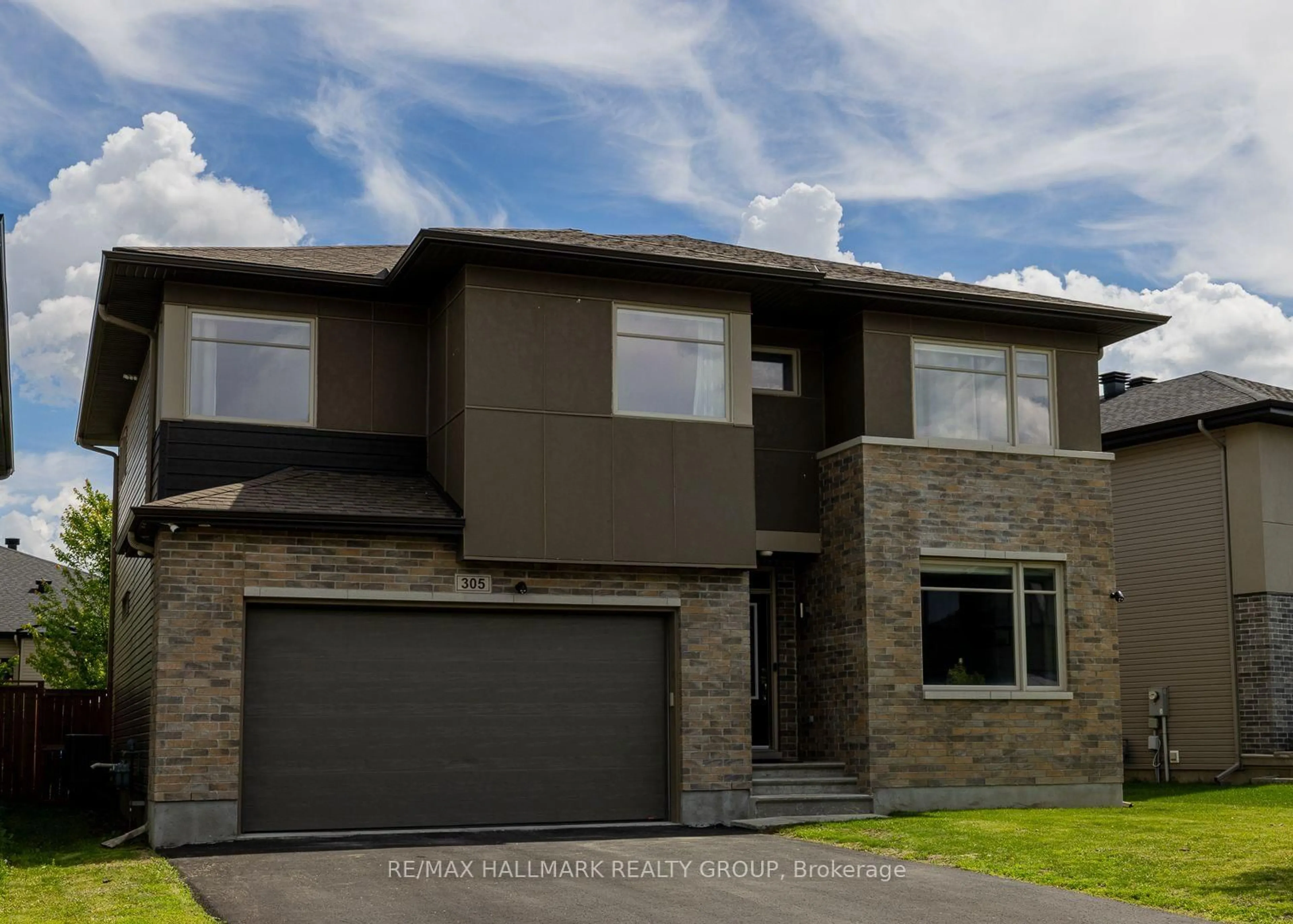 Home with brick exterior material, street for 305 Oxer Pl, Ottawa Ontario K2V 0C6