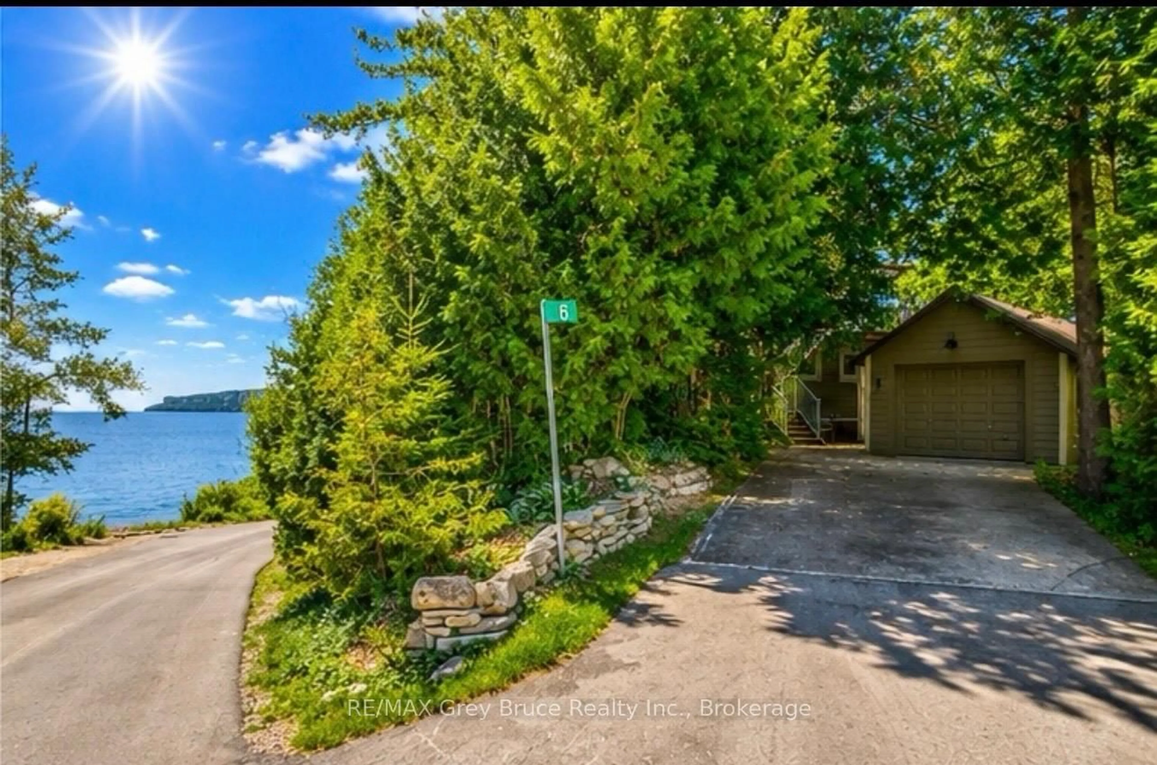 A pic from outside/outdoor area/front of a property/back of a property/a pic from drone, water/lake/river/ocean view for 6 Chetwynd Lane, Northern Bruce Peninsula Ontario N0H 1W0