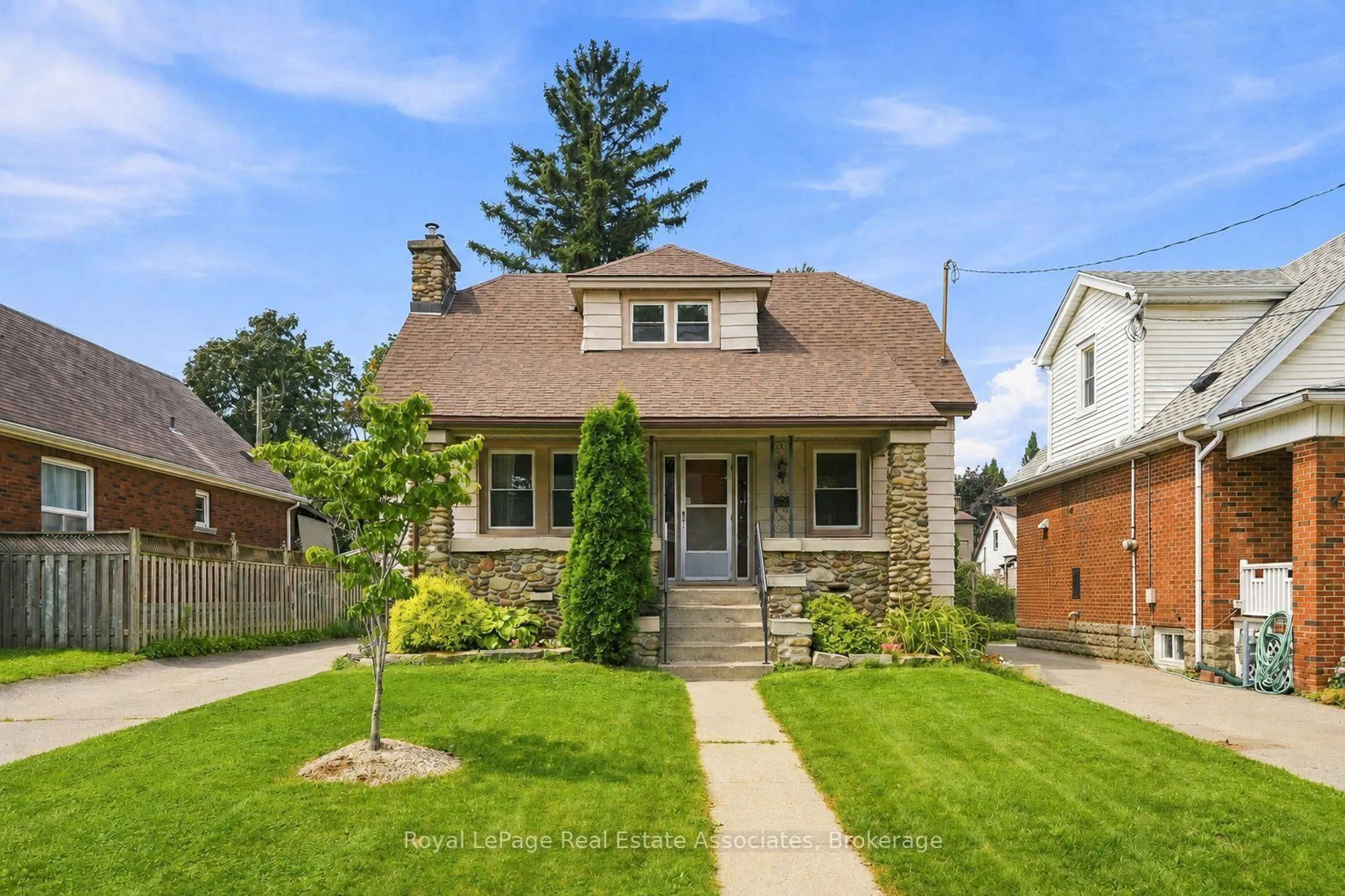 Home with brick exterior material, street for 96 Huxley Ave, Hamilton Ontario L8K 2P8