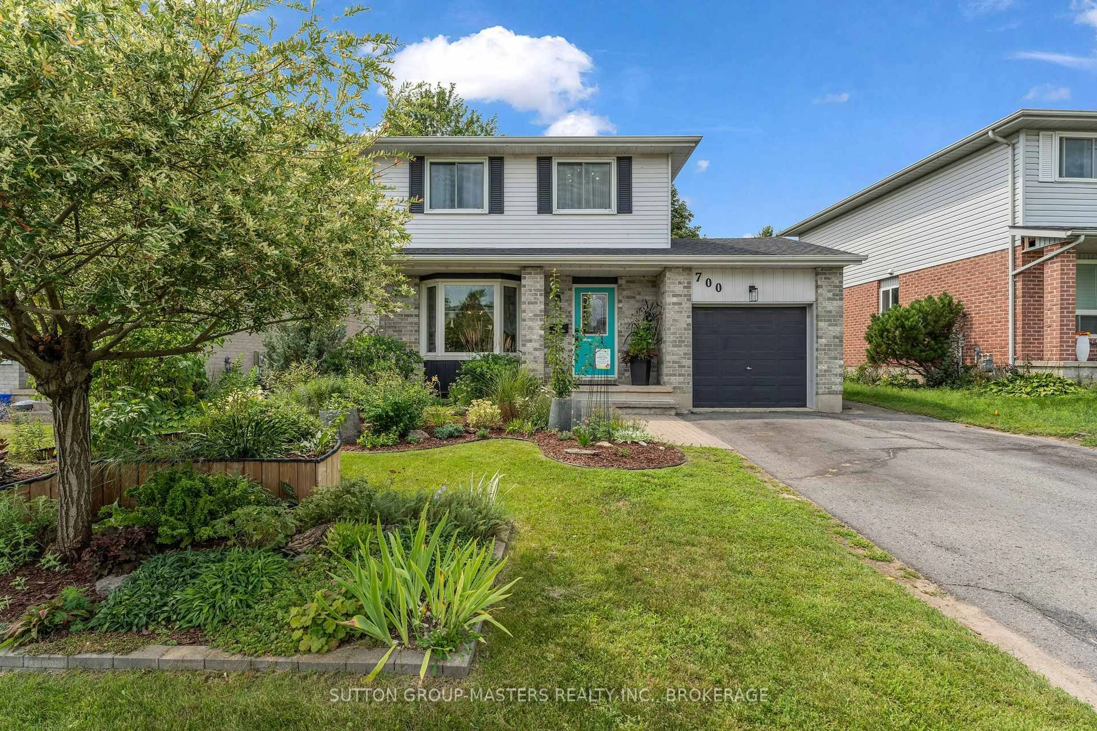 Home with brick exterior material, street for 700 Cedarwood Dr, Kingston Ontario K7P 2H9