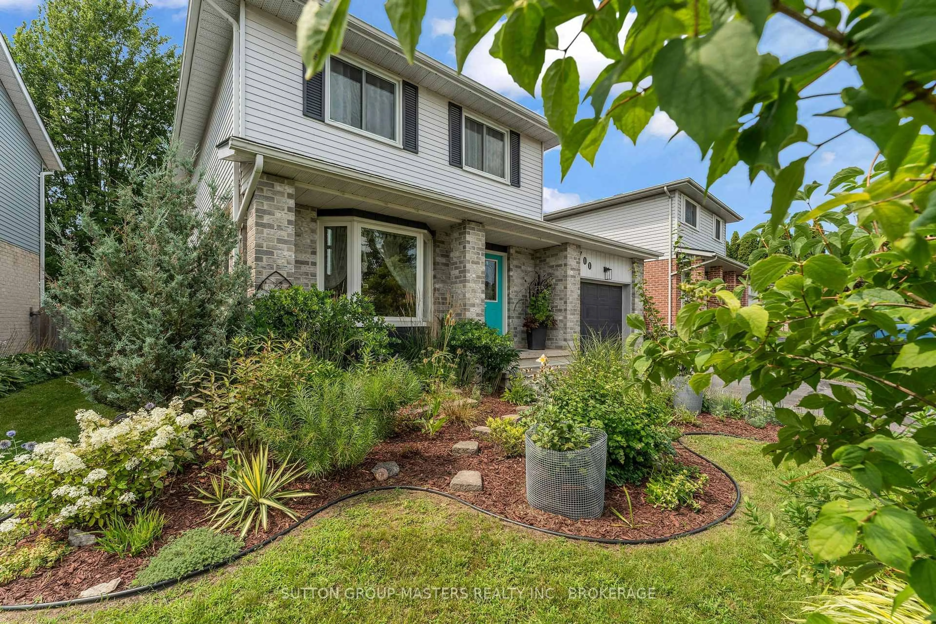 Home with brick exterior material, street for 700 Cedarwood Dr, Kingston Ontario K7P 2H9