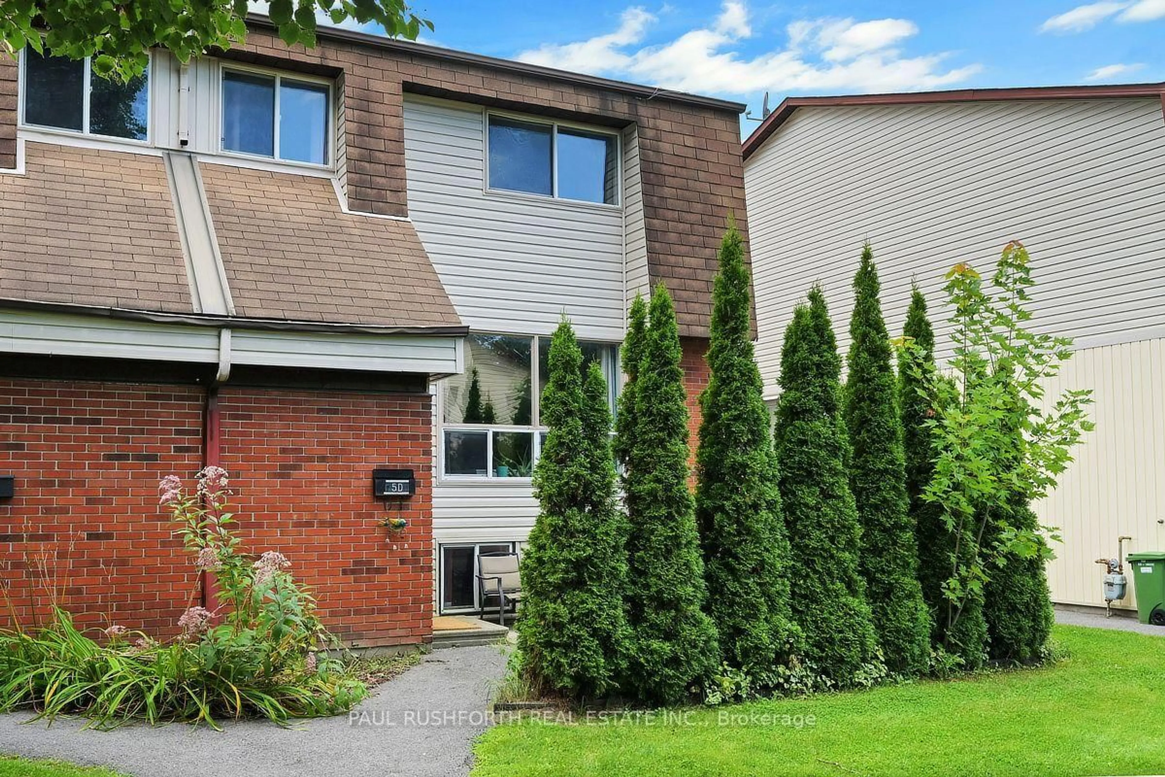 Home with brick exterior material, street for 5 Sonnet Cres #D, Ottawa Ontario K2H 8W8