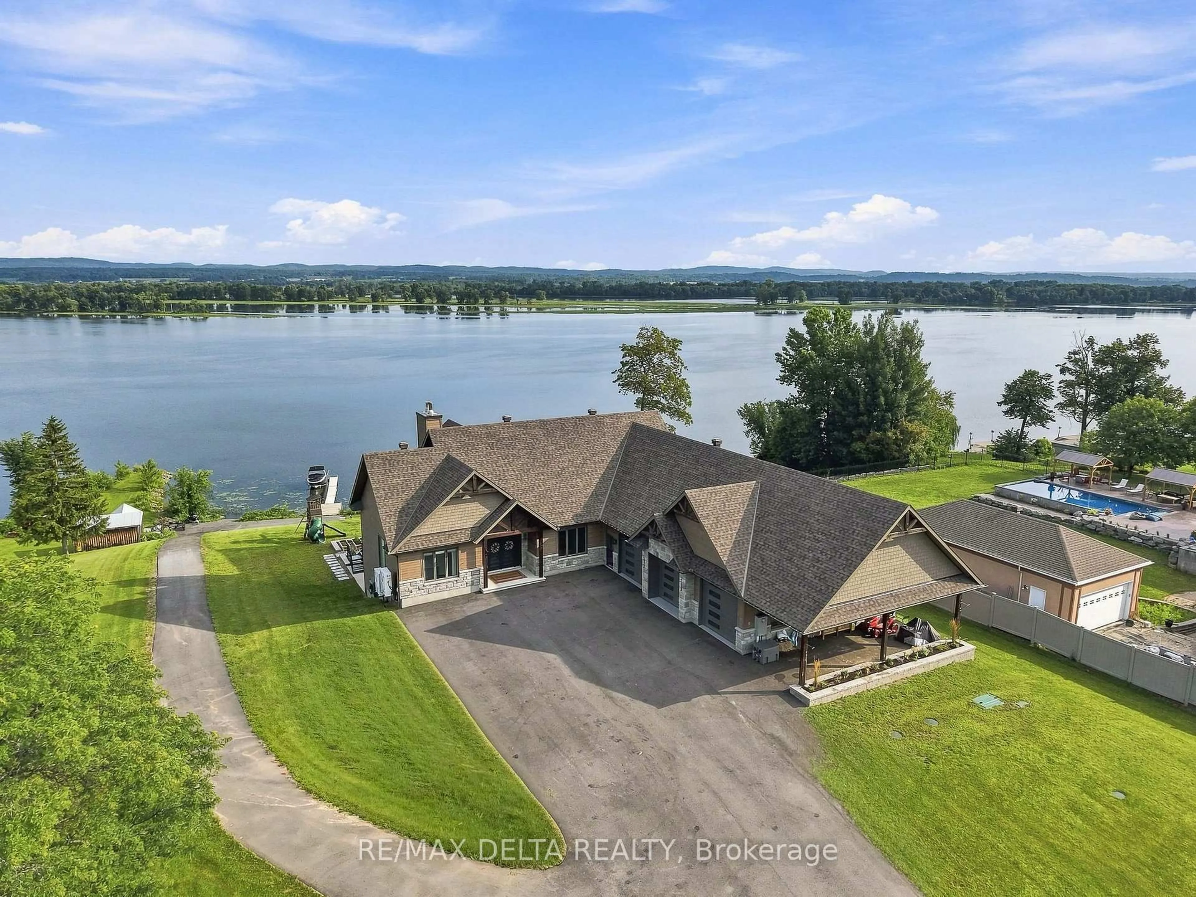 A pic from outside/outdoor area/front of a property/back of a property/a pic from drone, water/lake/river/ocean view for 3815 Old Highway 17 Rd, Clarence-Rockland Ontario K4K 1W2