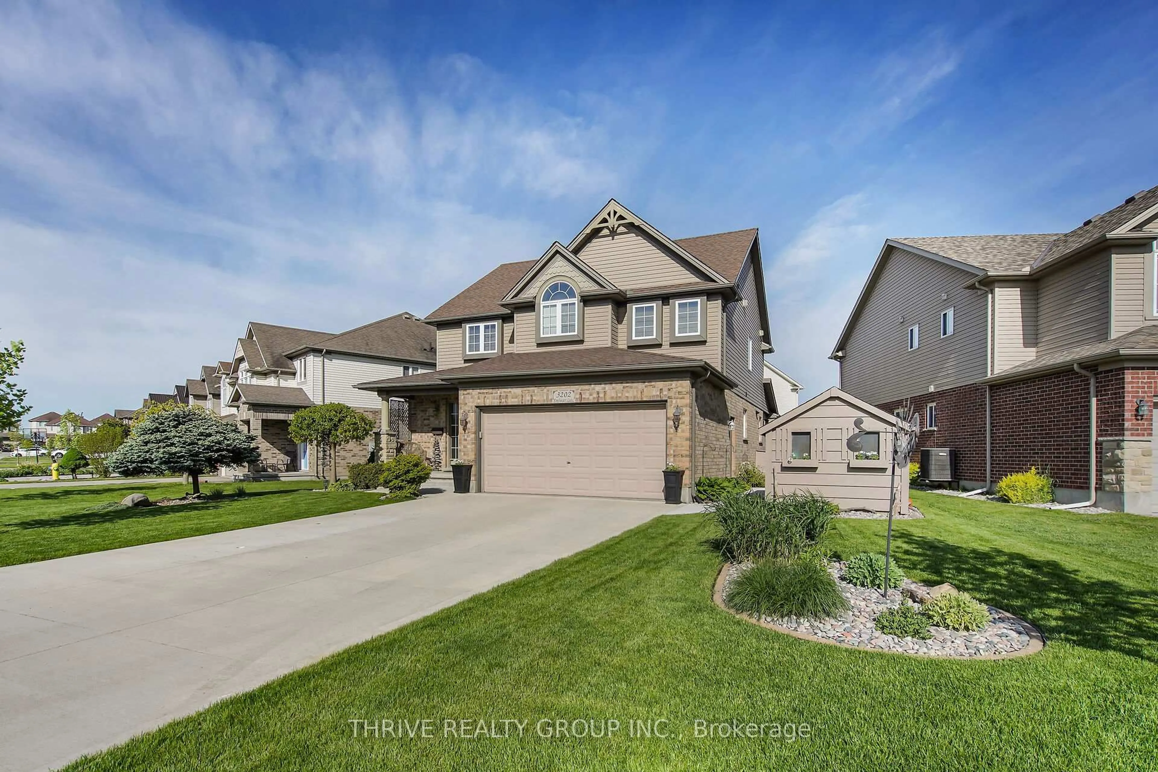 Home with vinyl exterior material, street for 3202 Emilycarr Lane, London South Ontario N6L 0B2