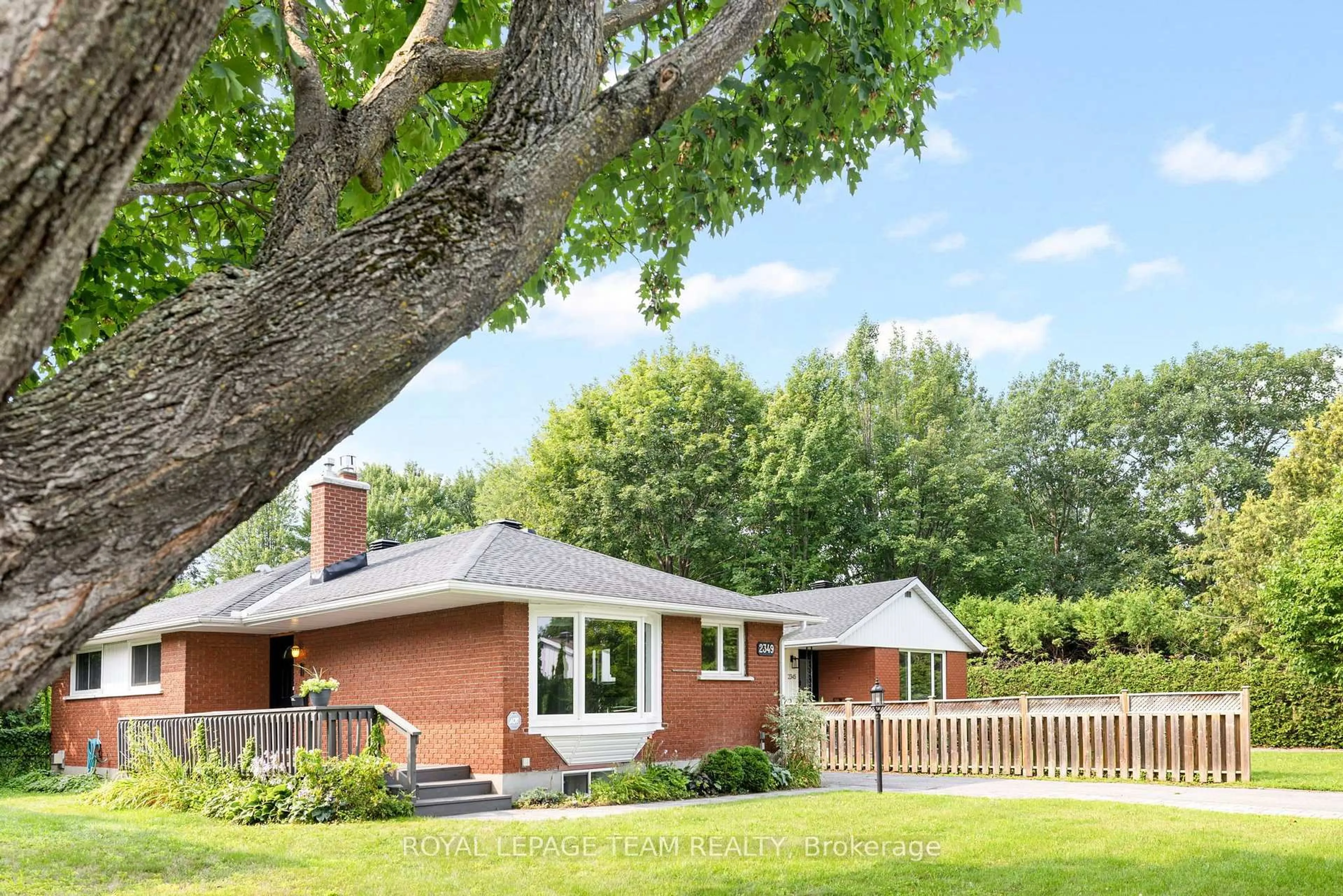 Home with brick exterior material, street for 2349 Edwin Cres, Ottawa Ontario K2C 1H8