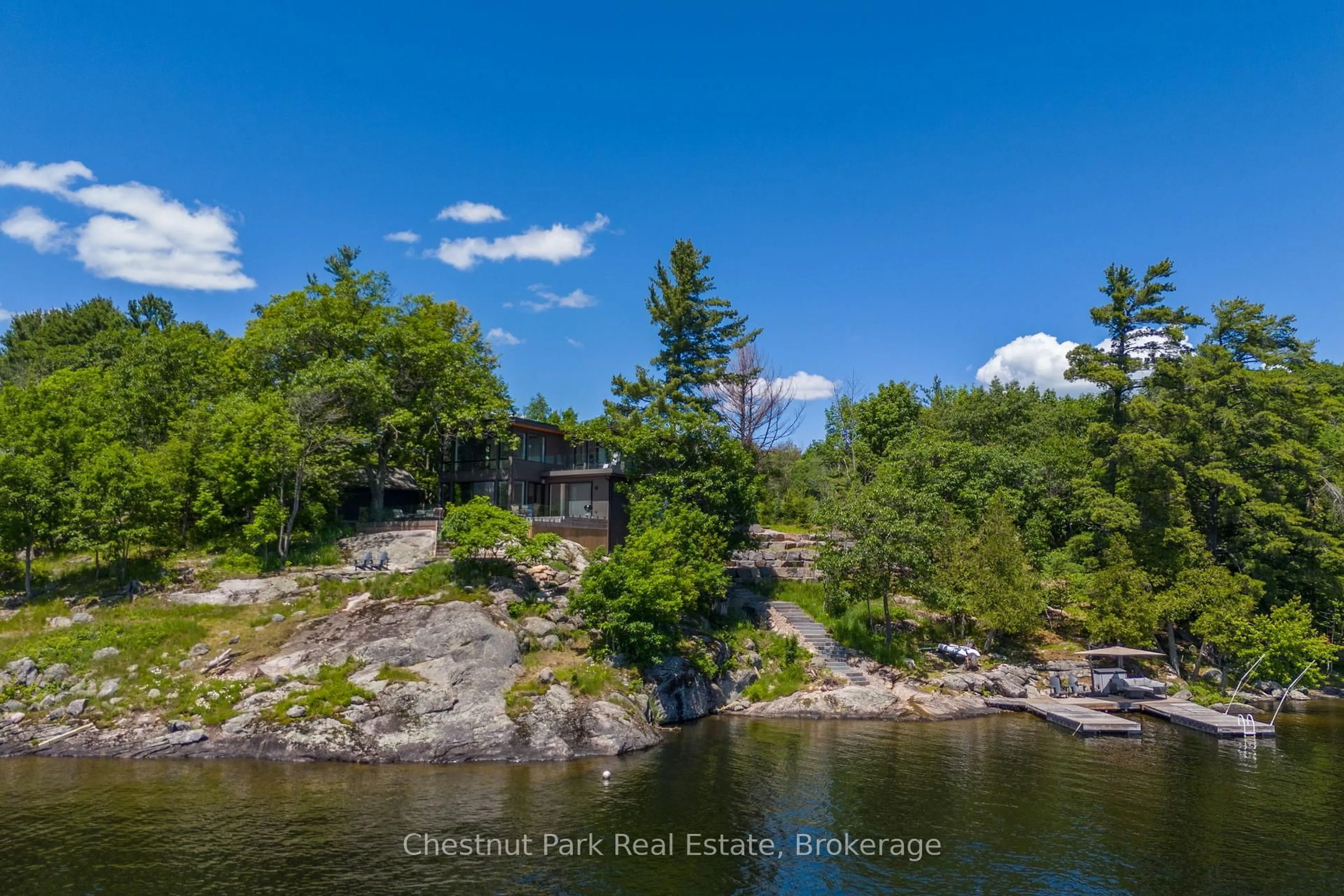 A pic from outside/outdoor area/front of a property/back of a property/a pic from drone, water/lake/river/ocean view for 1330 Rosseau Lake Road 2 Rd #17, Muskoka Lakes Ontario N9Y 2E4